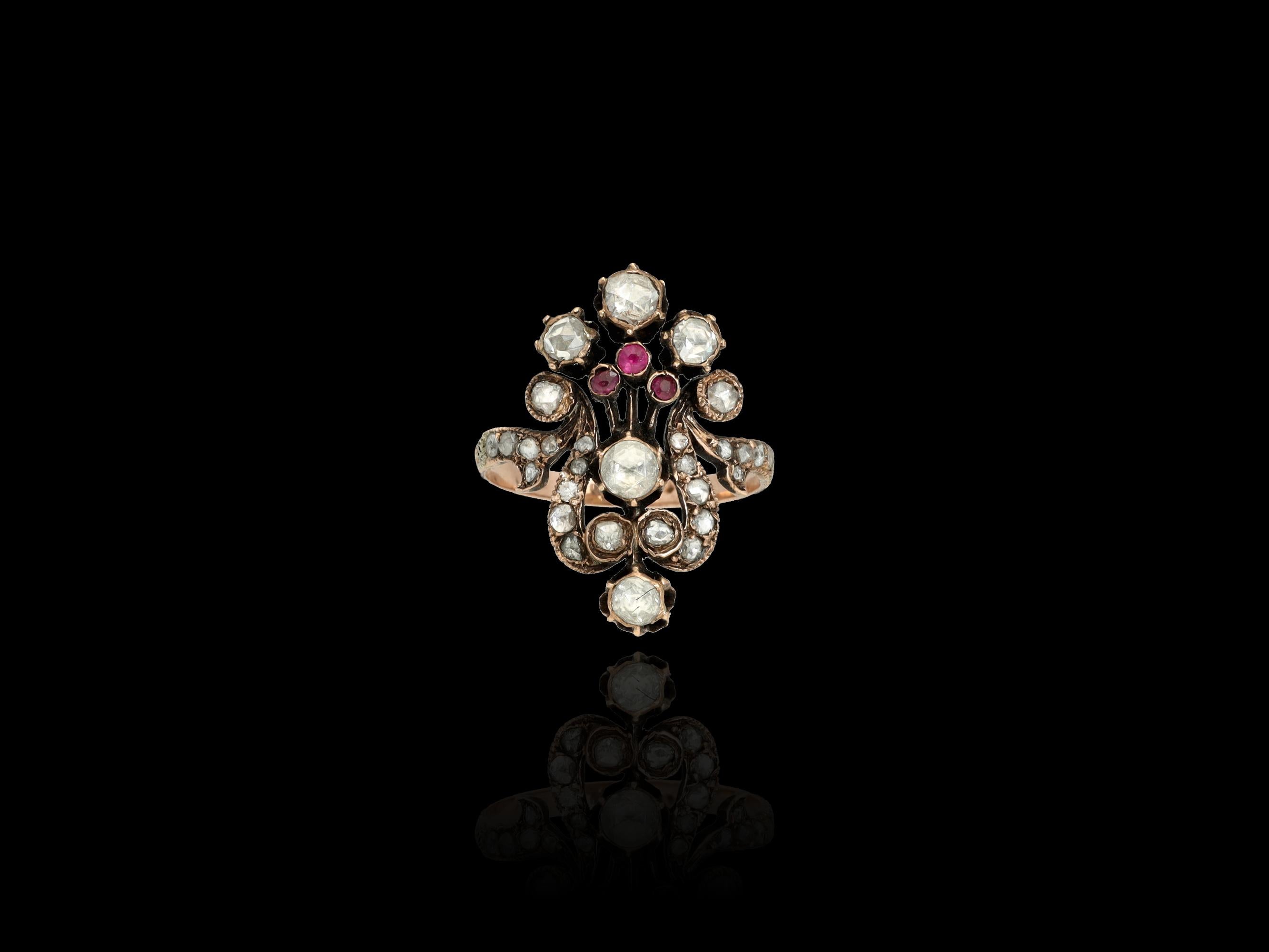 A head-turning antique Victorian diamond and ruby giardinetti ring! Giardinetti stands for “little garden” is one of the most romantic historic ring setting styles that symbolizes a floral arrangement. It was widely popular in 17 -19th century