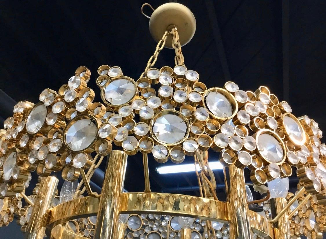 Stunning round Art Nouveau brass, glass and metal eight-light chandelier with great scale.
Still in great condition, circa 1960s. It measures twenty inches in diameter and all other dimensions
are below. Wired for the USA and in perfect working