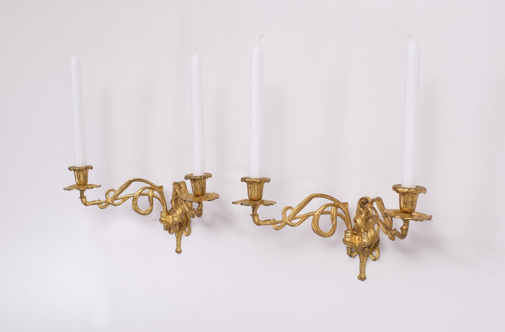 Superb Art Nouveau set of gilded bronze candle sconces. Beautiful color.
every piece is Signed by the maker E Muller Paris 1920s Very nice quality.
Two candles each. Very good condition.