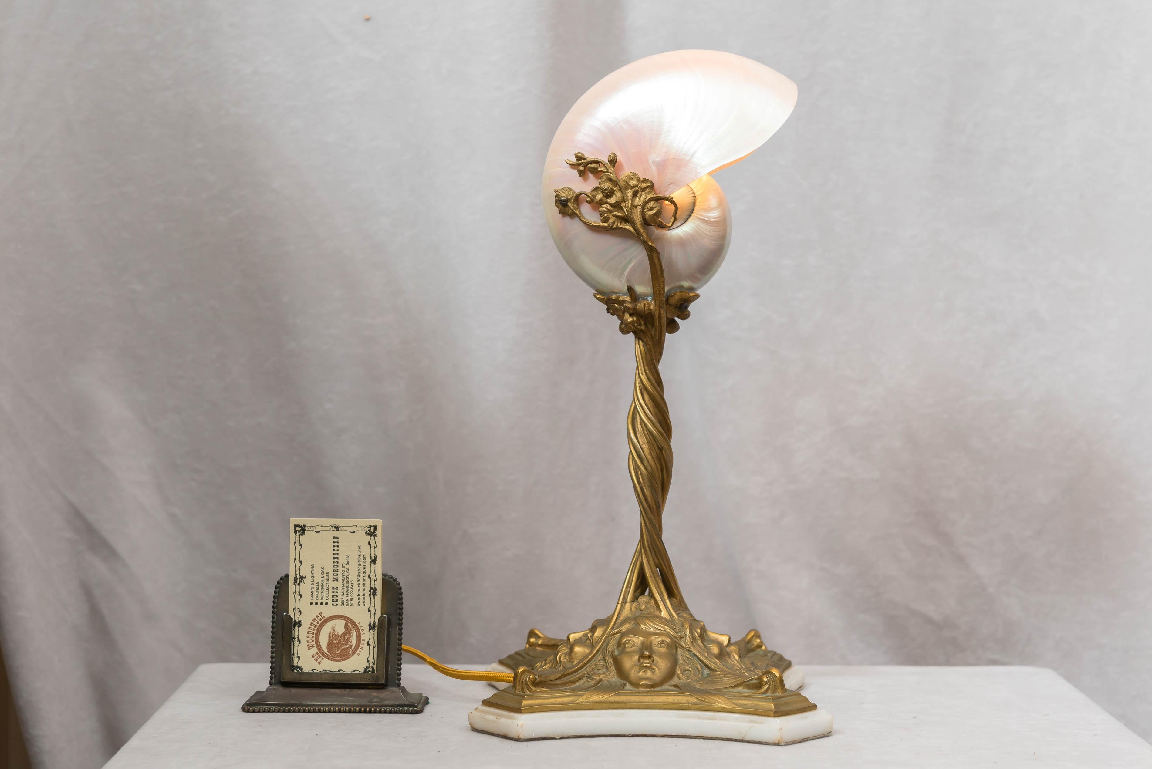 This has to be one of the best lamps we have in the shop currently. We are always looking for nautilus shell lamps, and oddly as rare as they come up for sale, the metal work is almost always disappointing. Not bronze, nor well cast, disappointing.