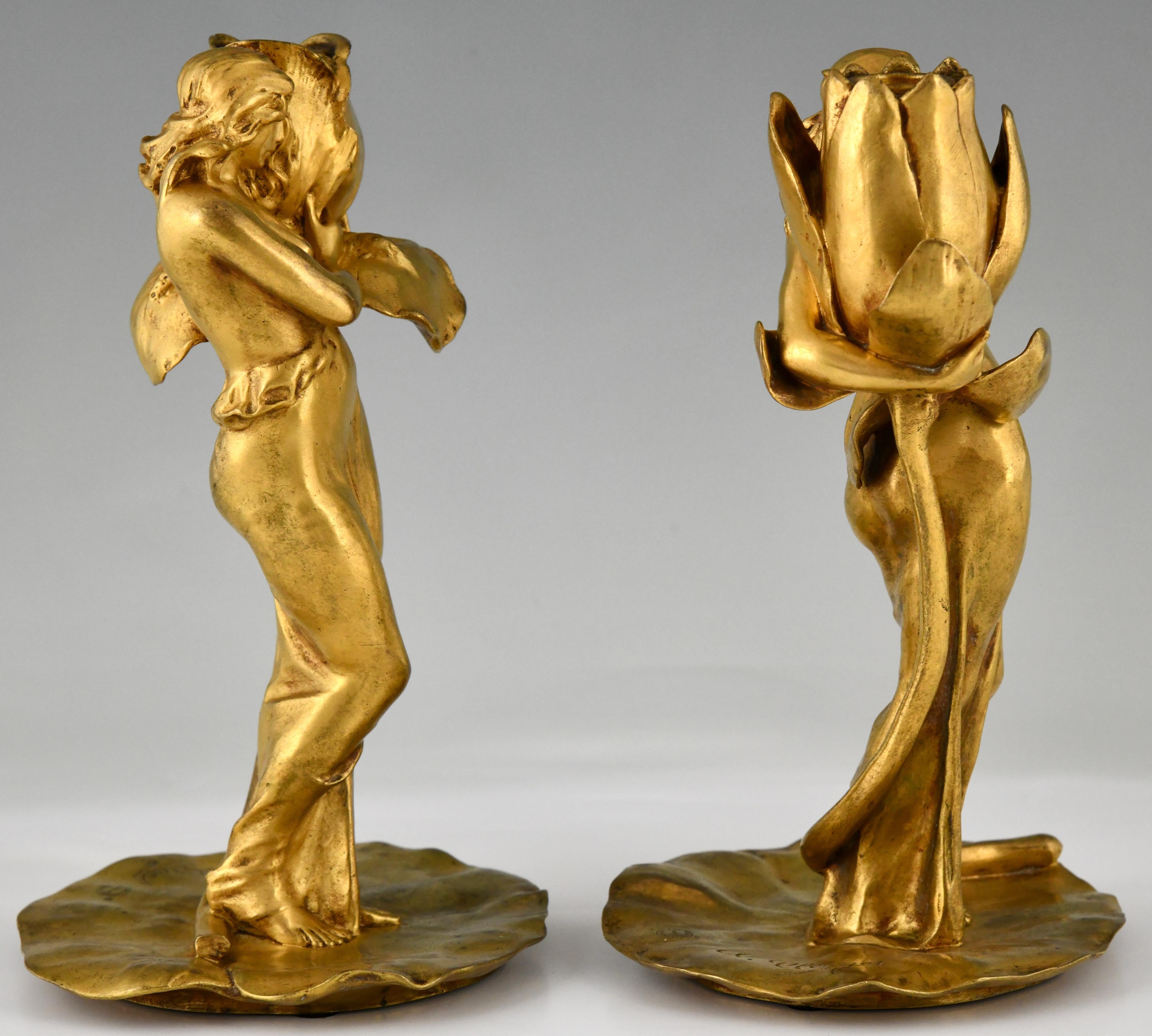 Art Nouveau gilt bronze candlesticks lady with flower Iris & Lotus by A. Clerget In Good Condition In Antwerp, BE