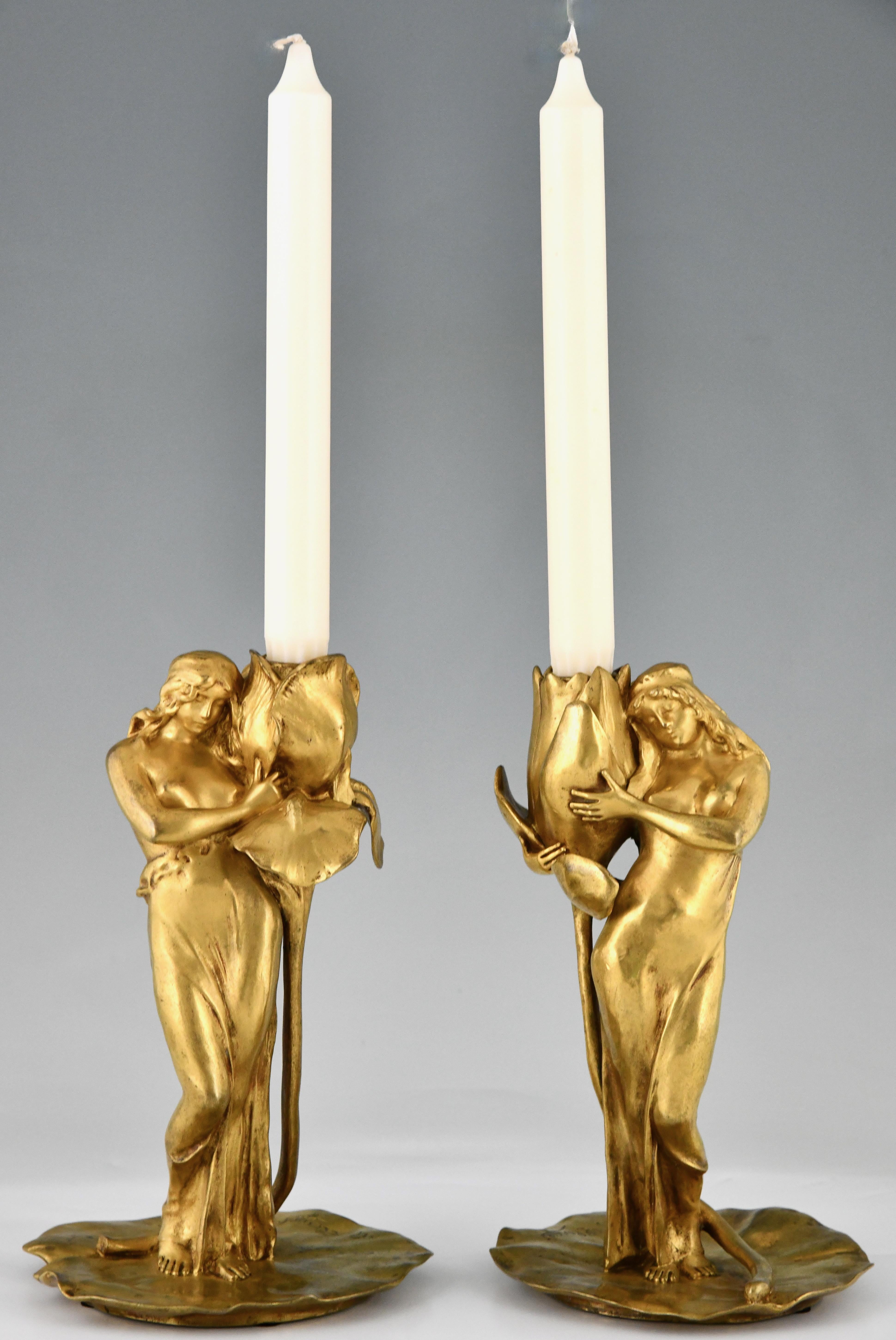 20th Century Art Nouveau gilt bronze candlesticks lady with flower Iris & Lotus by A. Clerget