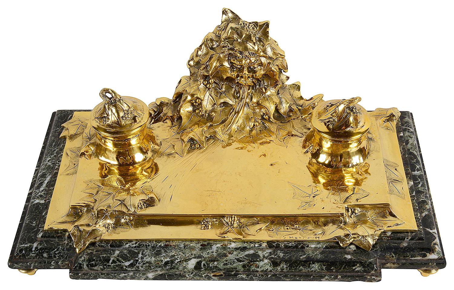 A very comprehensive five piece, late 19th century gilded bronze Art Nouveau desk set by ;
Albert Marionnet (1852-1910).
Each piece have these mythical busts coming out of the ground with Ivy wrapped around him,
signed A. Marionnet.
Mounted on