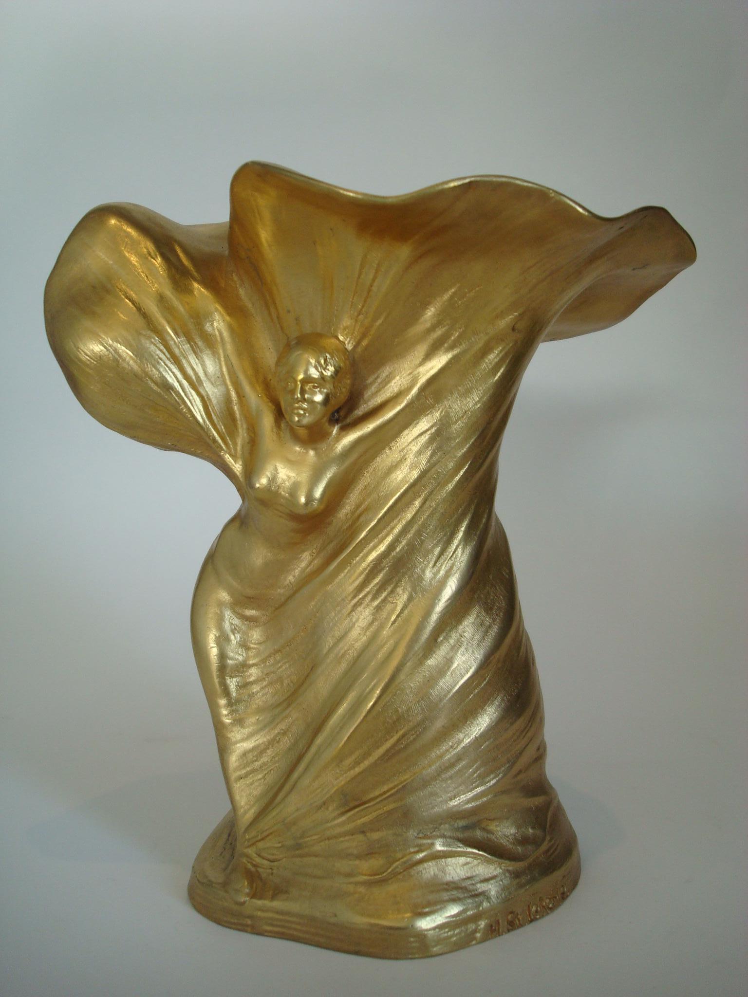 Beautiful Art Nouveau vase in Gilt bronze depicting the famous dancer Loïe Fuller. The vase is signed by the artist Hans Stoltenberg Lerche (1867-1920) and has the Louchet founders' signature, France, circa 1900.

Loie Fuller (born Marie Louise