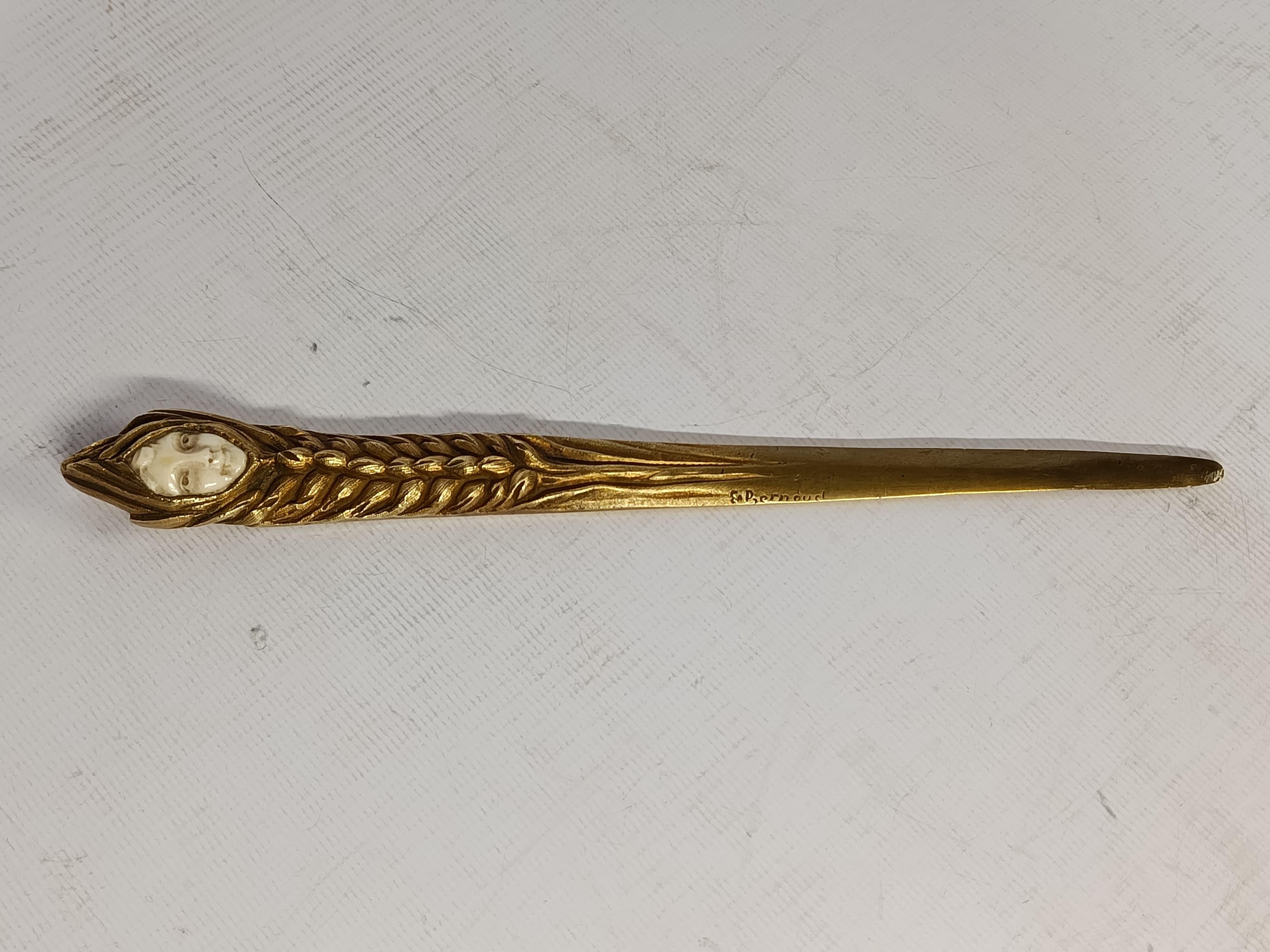 Early 20th Century Art Nouveau gilt bronze letter opener, France, circa 1910 E. bernadaud For Sale