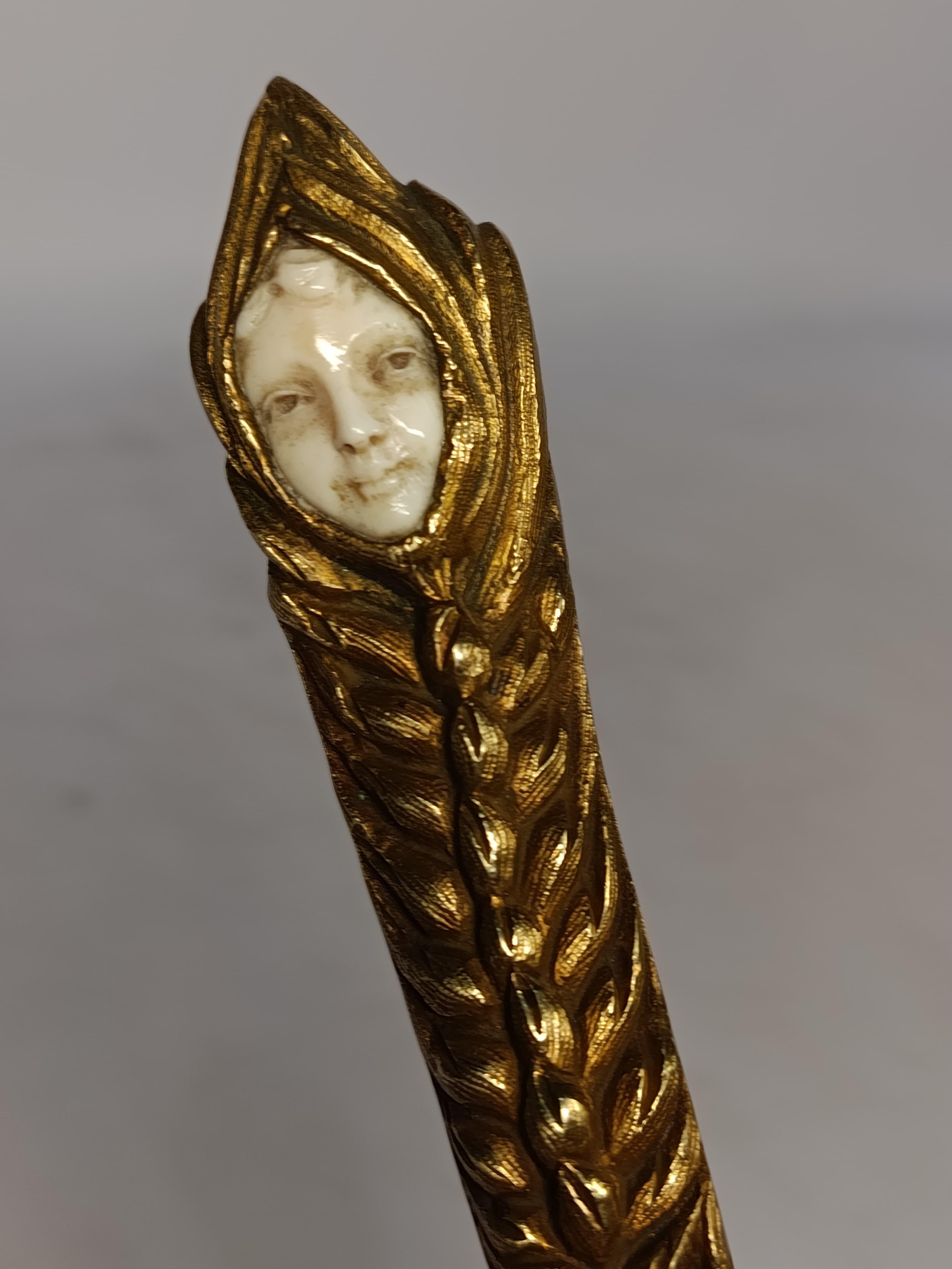 Bronze Art Nouveau gilt bronze letter opener, France, circa 1910 E. bernadaud For Sale