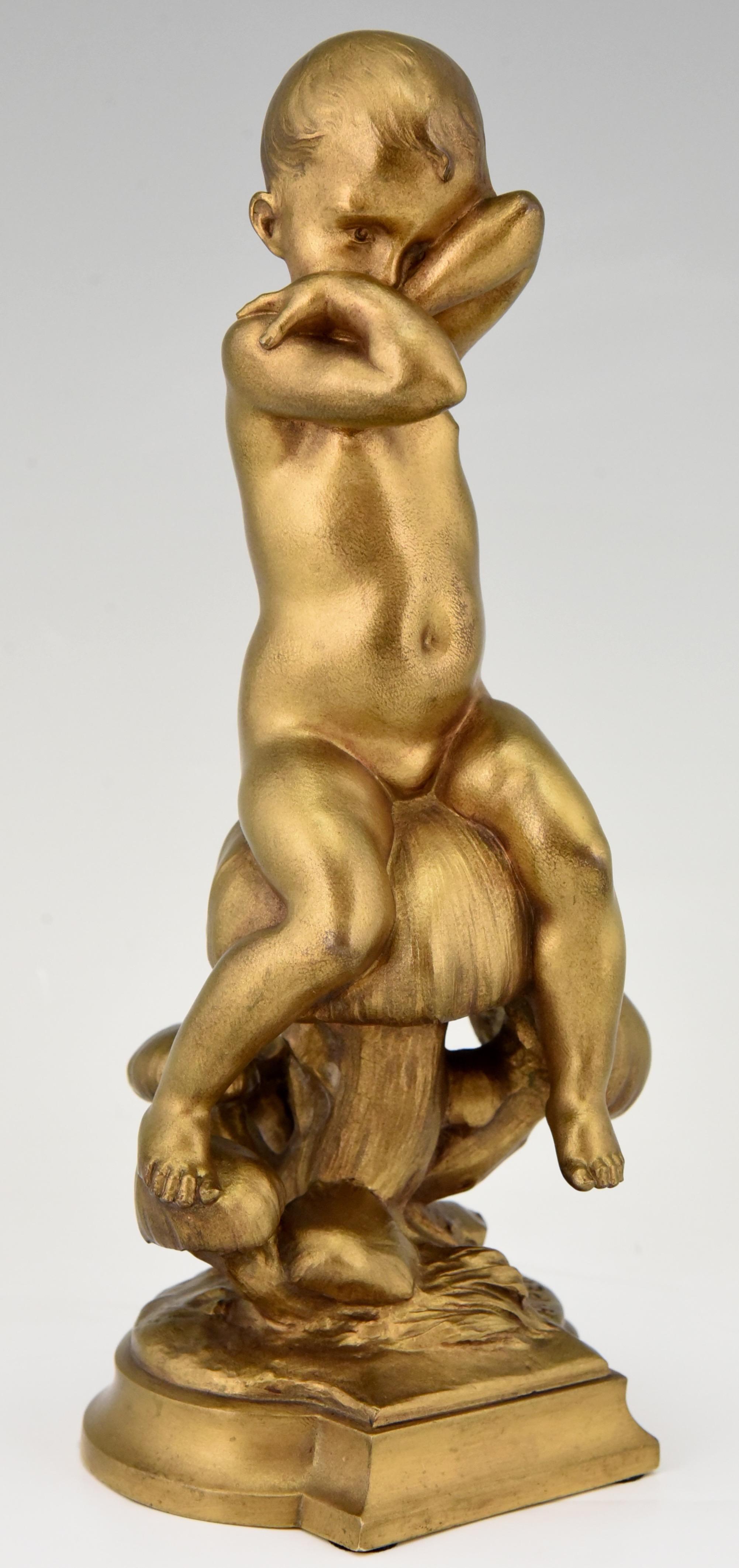 Lovely Art Nouveau gilt bronze sculpture of a little boy an a mushroom by Herni Pernot. France 1905 
Entitled 