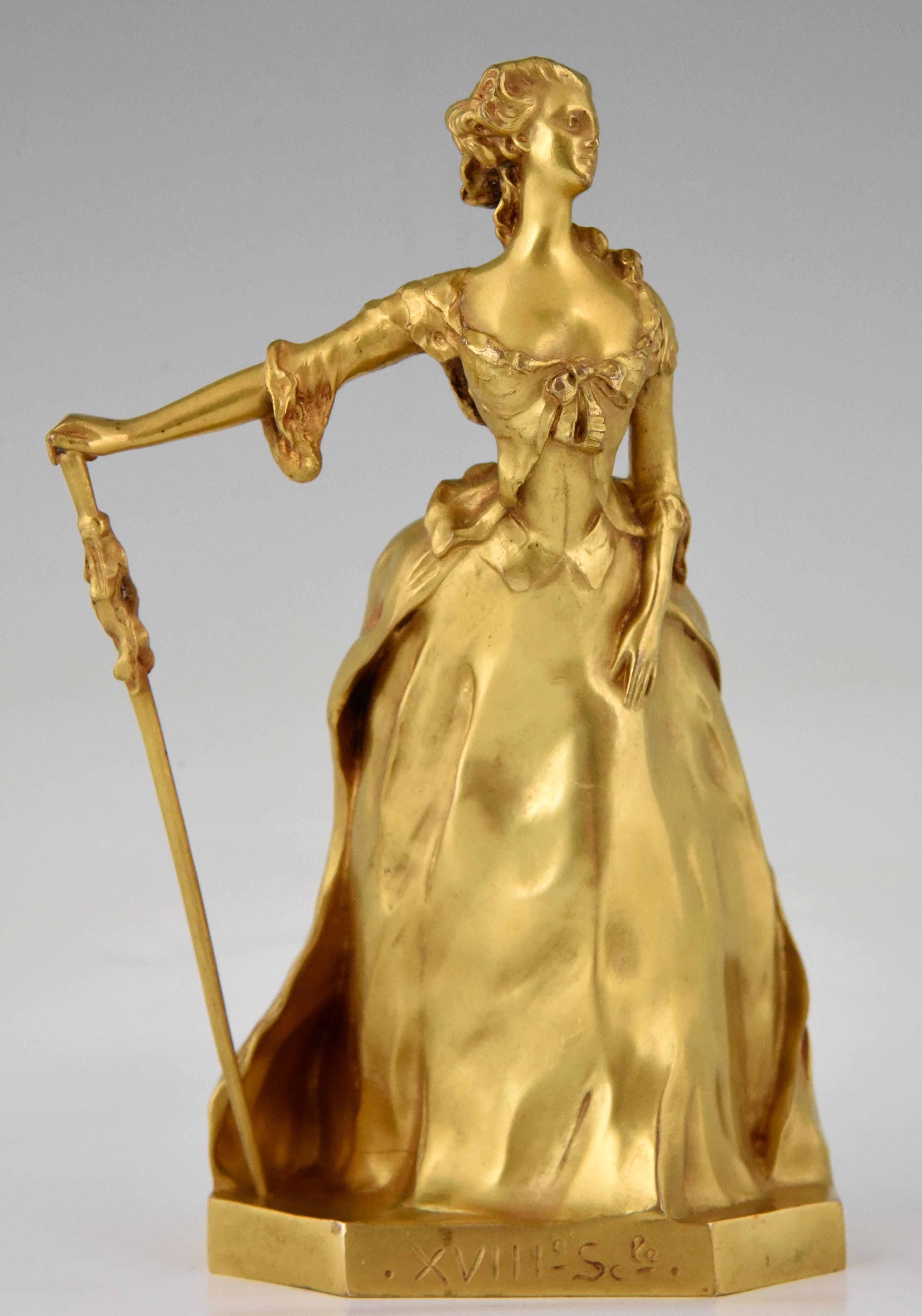 Art Nouveau gilt bronze sculpture of an elegant woman entitled Parisienne of the 18th century. This beautiful bronze is signed by Henri Frederic Varenne and bears the Susse Freres foundry mark, cast in France, circa 1900.
Literature:
