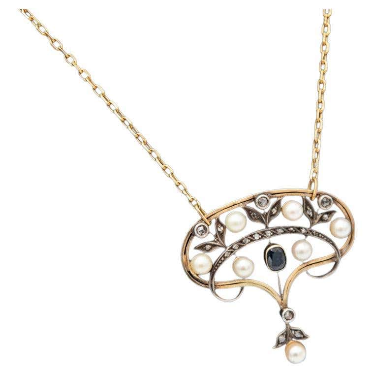 Salvador DALI - Pendentif montre molle en métal doré - Art Moderne Salvador DALI - Pendentif montre molle en métal doré - Art Moderne