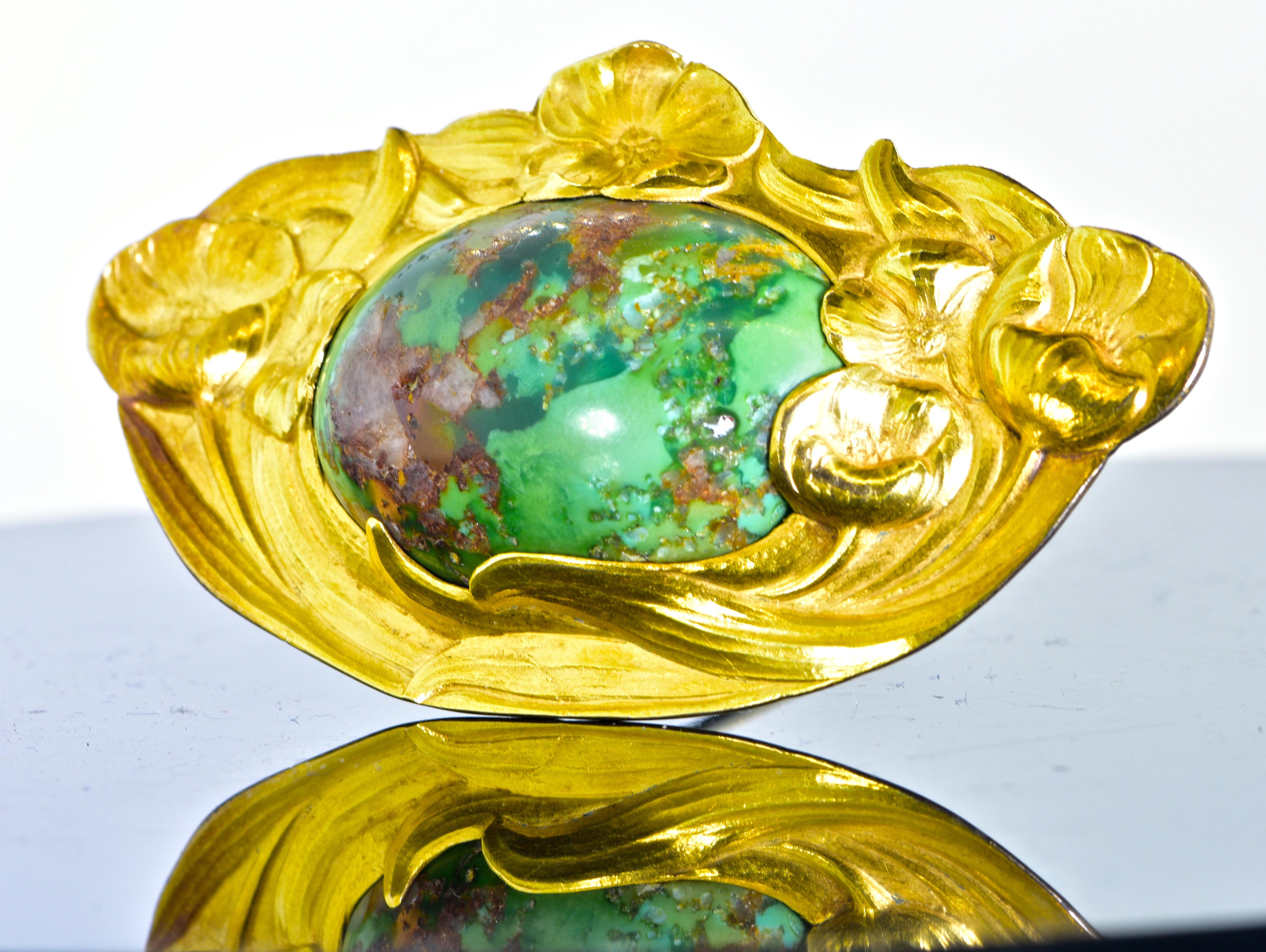 Large and impressive antique Art Nouveau brooch centering a natural matrix turquoise with a motif of 