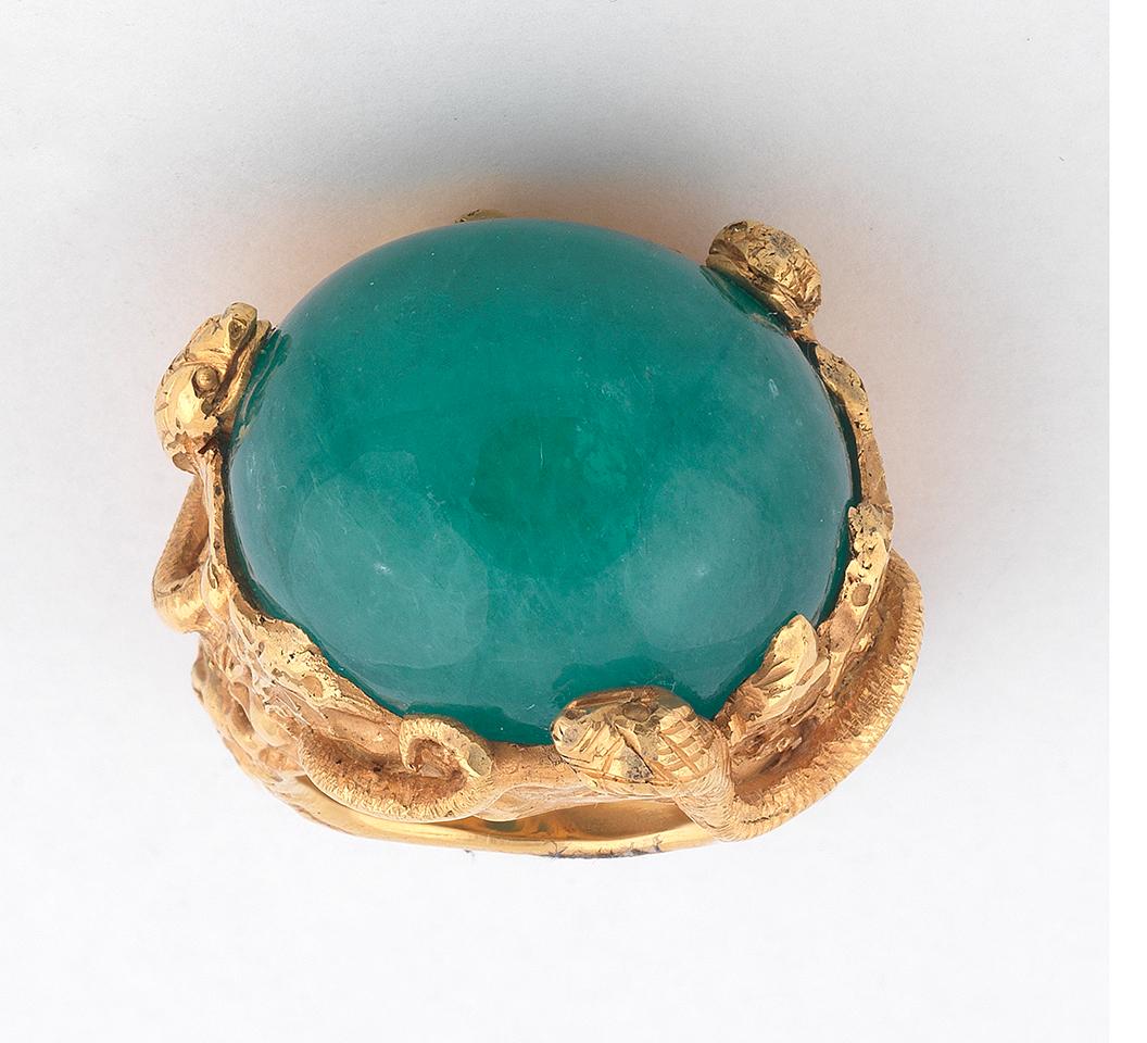 Bernardo Antichita' Ponte Vecchio Florence
depicting a snake amongst foliage that wraps around the cabochon emerald.
The weight of the emerald is approximately 57 ct
Weight : 40.8gr
Size : 8 1/4