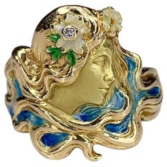 Art Nouveau Gold Enamel and Diamonds Ring Depicting the Face of Daisy Goddess