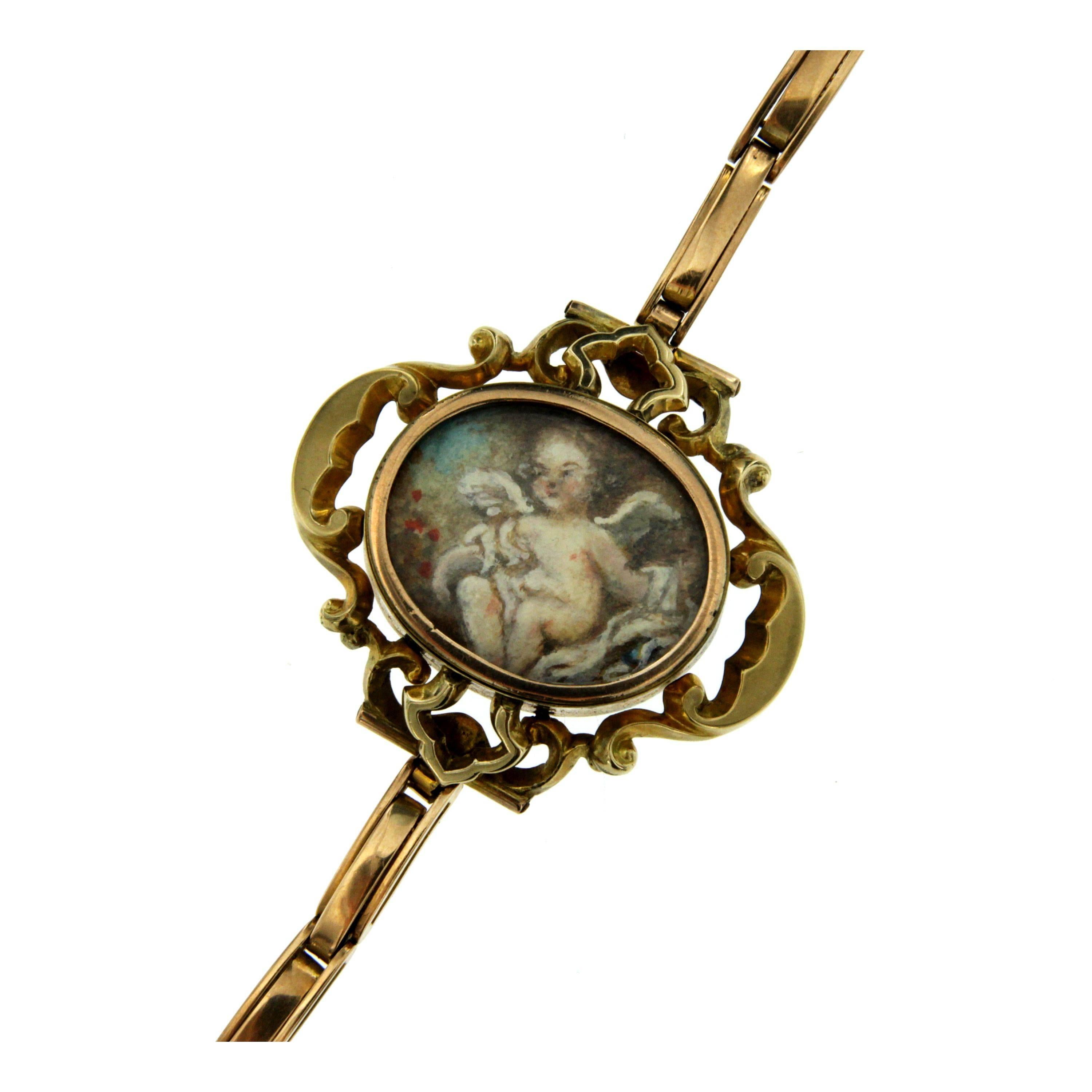 This Art Nouveau bracelet is crafted in 9k rose gold and is adorned with a large frame in the center. 
This handmade bracelet has elastic links to adapt to every size.
Safety clasp. Circa 1920 

CONDITION: Pre-Owned - Very good
METAL: 9k Gold 
FRAME