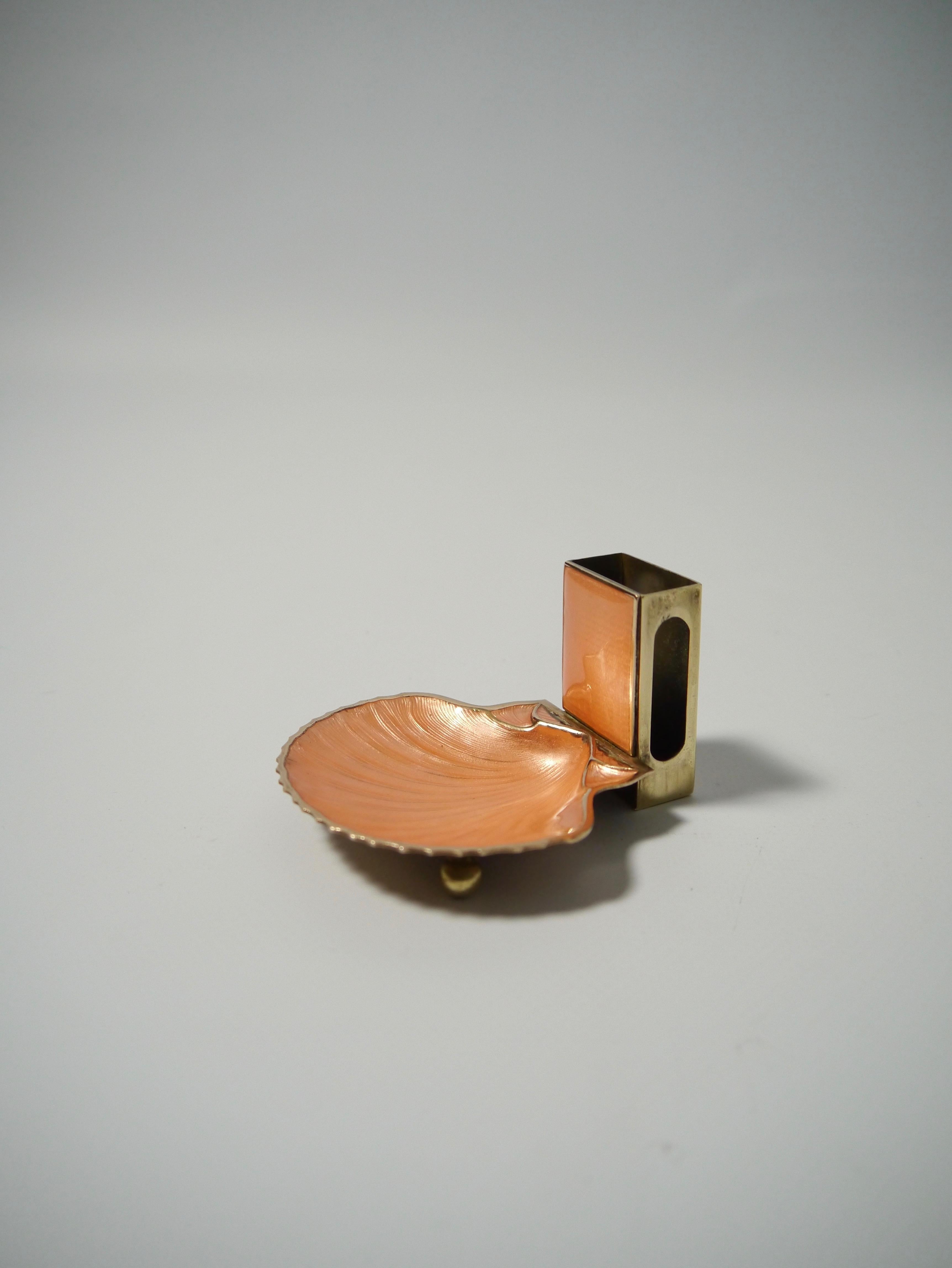 Seashell shaped Art Nouveau matchstick box holder. Gold-plated copper, seashell and box holder enameled on top/front.