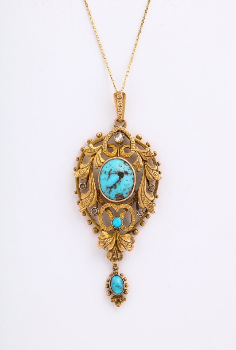 I encourage you to enlarge a photo and look closely at the gold engraving on this Art Nouveau turquoise and diamond pendant as it is outstanding. Before the sharp geometry of the Art Deco period, the curves and the nature shown in Art Nouveau jewels