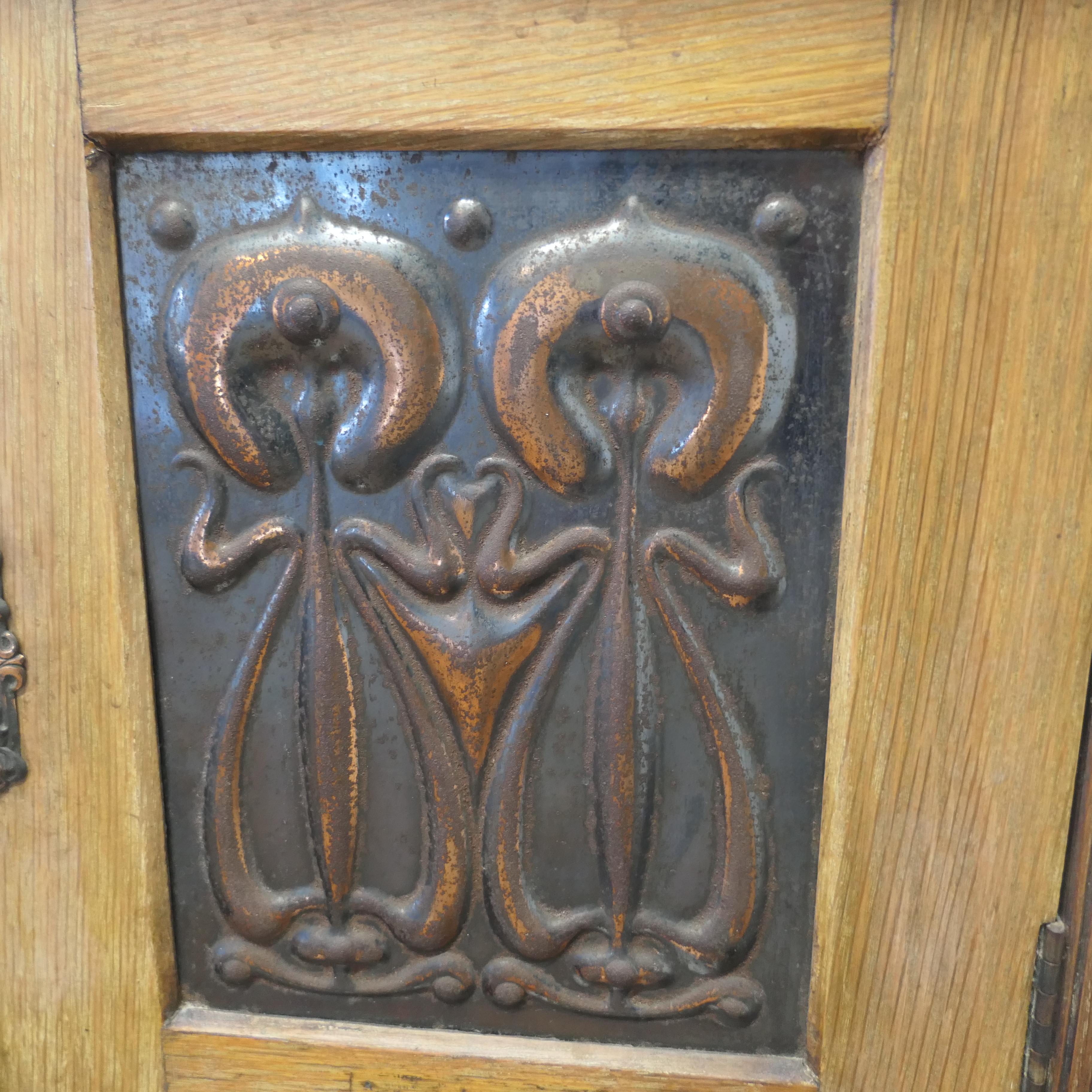 Late 19th Century Art Nouveau Golden Oak and Copper Smokers Cabinet  A delightful piece, the cabin For Sale