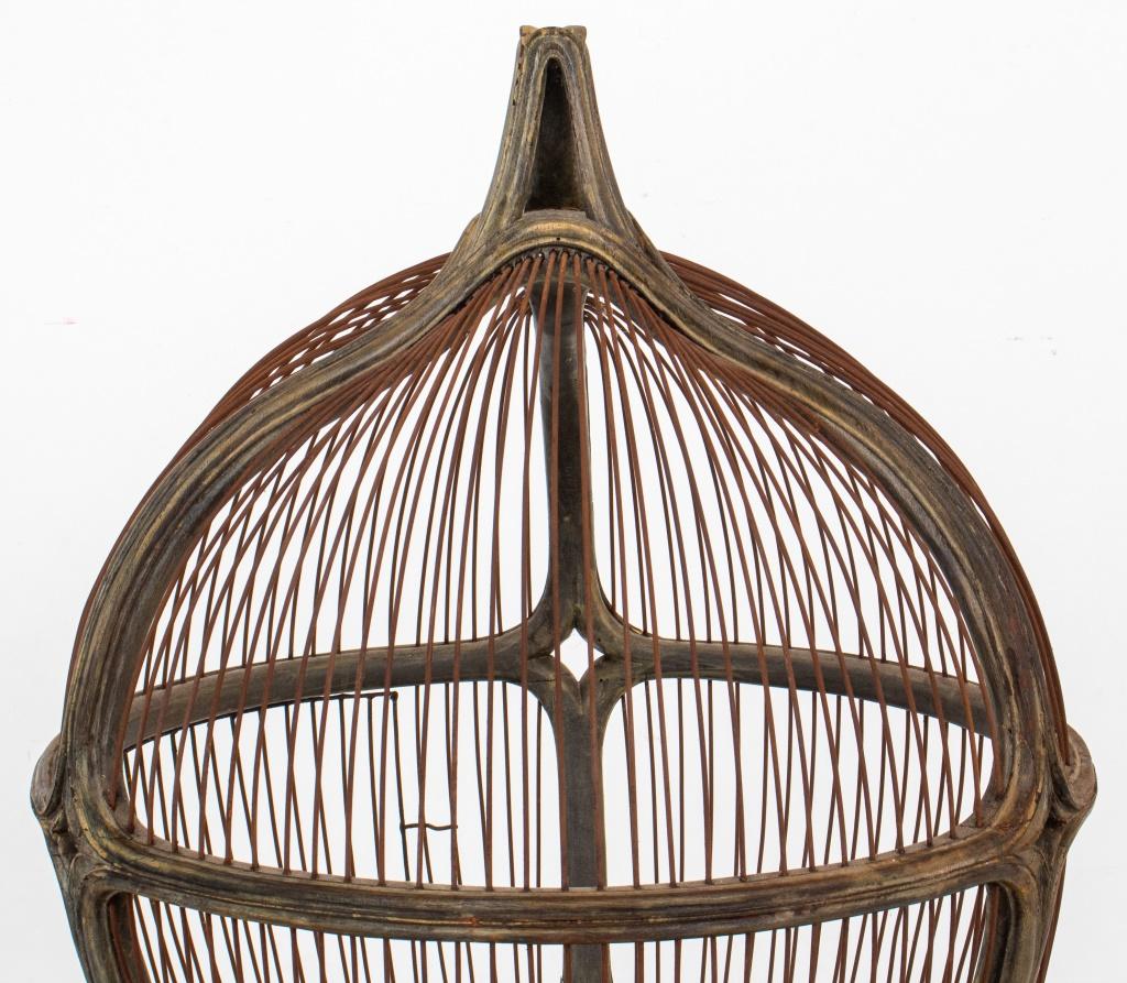 Art Nouveau Gray-Painted Wooden Bird Cage, ca. 1900, likley American, the domed body and wired sides with door and spreading skirt on circular base. 

Dimensions: 34