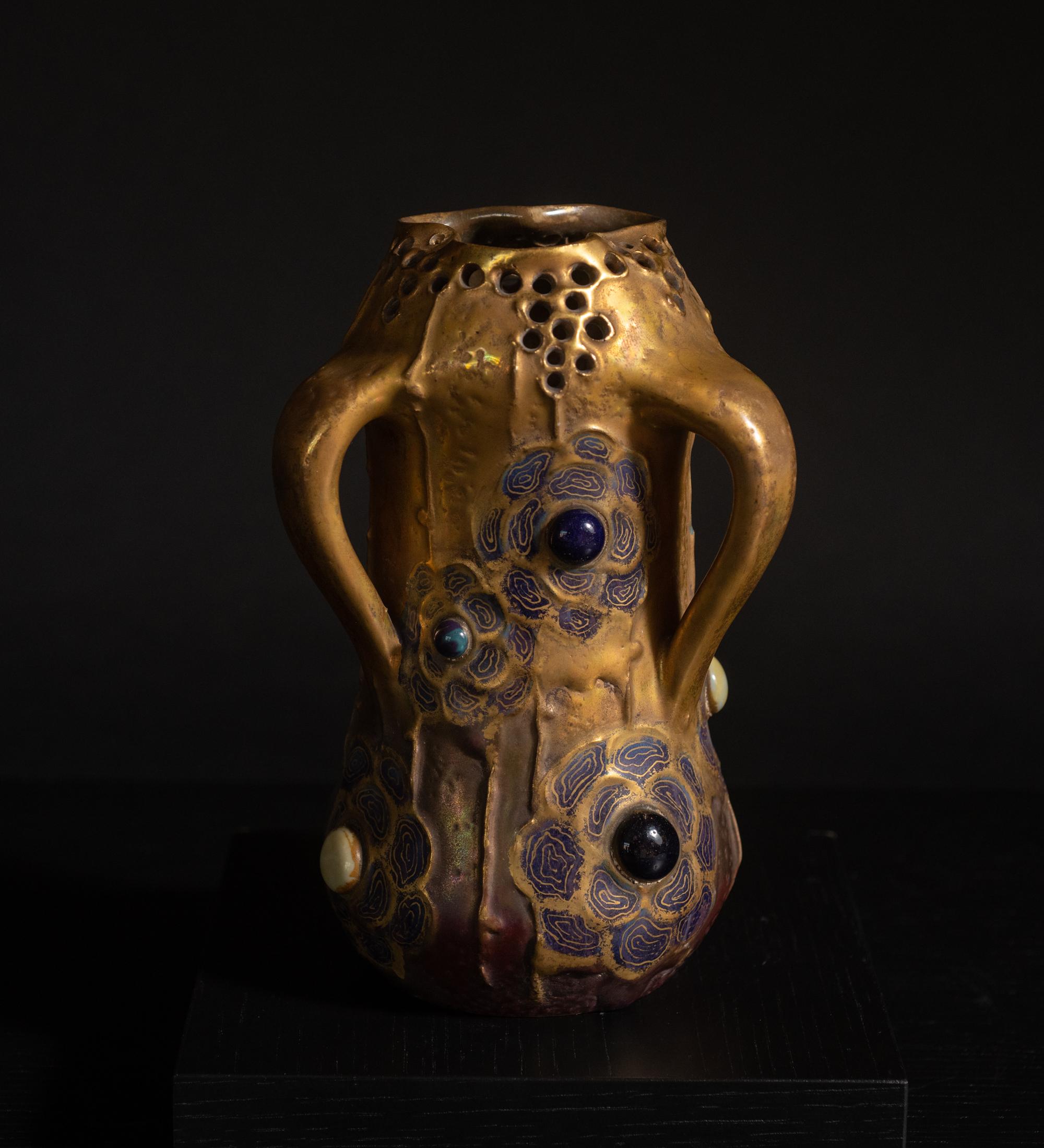 Model #3356

Riessner, Stellmacher and Kessel (RSt&K), consistently marked pieces with the tradename “Amphora” by the late 1890s and became known by that name. The Amphora pottery factory was located in Turn-Teplitz, Austria. By the mid-19th