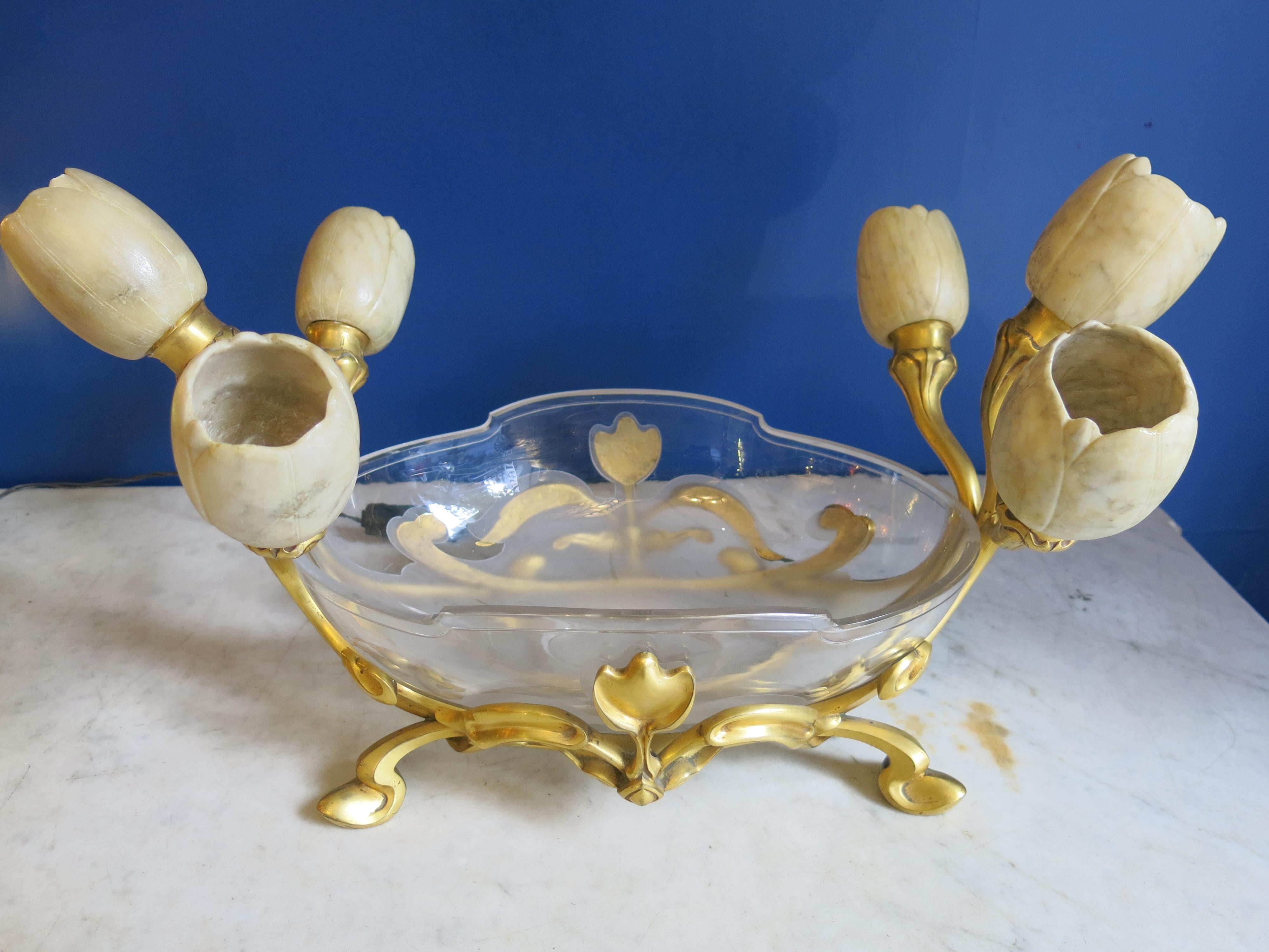Very unique mercury gilt bronze jardiniere signed on the base Gustave Keller with Albert Cheuret alabaster tulip lamps. The acid etched glass is in excellent shape made specially for the piece to match the bronze form. Electrified in excellent
