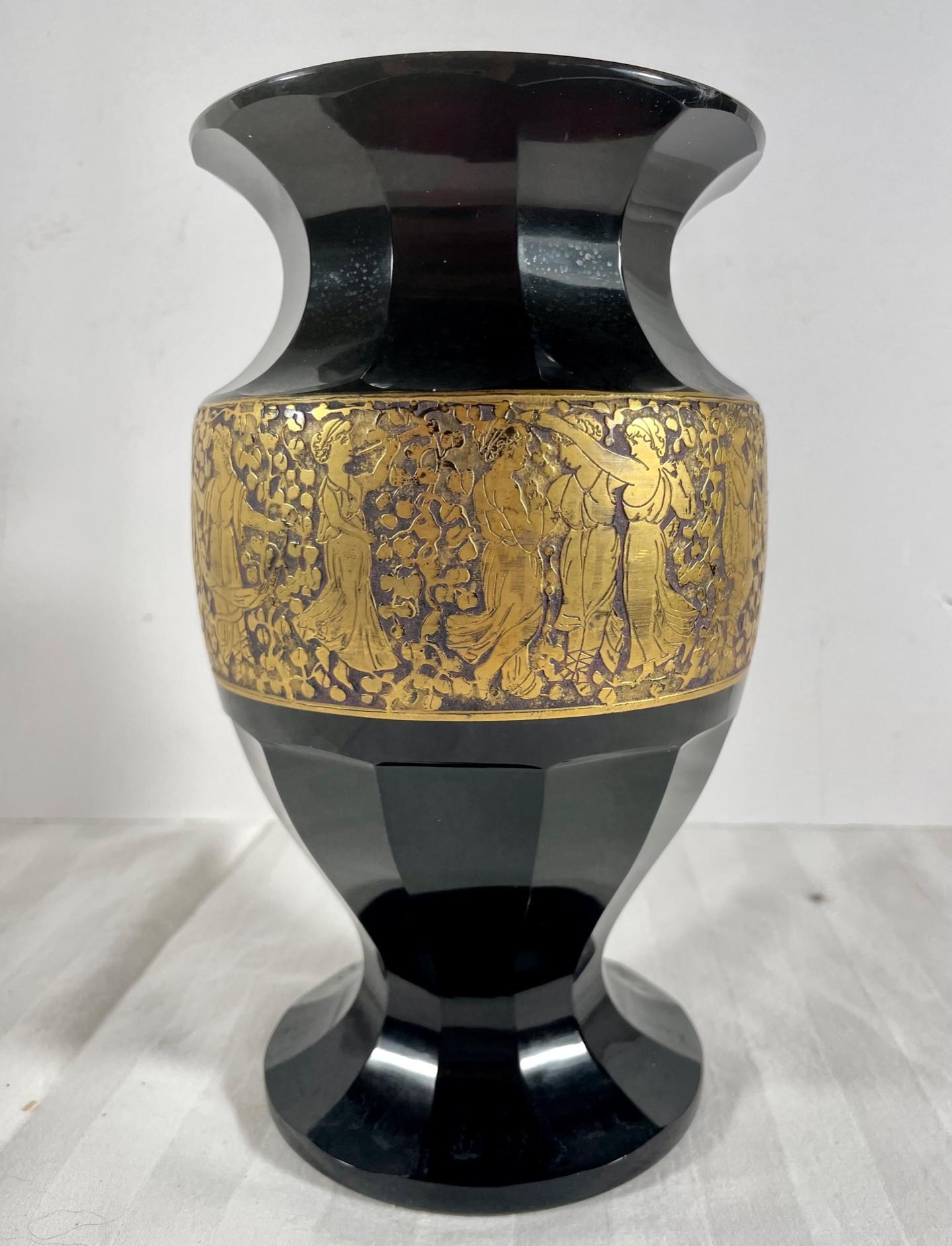 Art Nouveau Haida Moser Amethyst Amphora Vase by Adolf Rasche c1910, Signed.

A beautiful and heavy Moser rich amethyst vase with gold gilded frieze. Hand blown purple crystal with a wide band of gold around the shoulder. Decorated with a cameo cut
