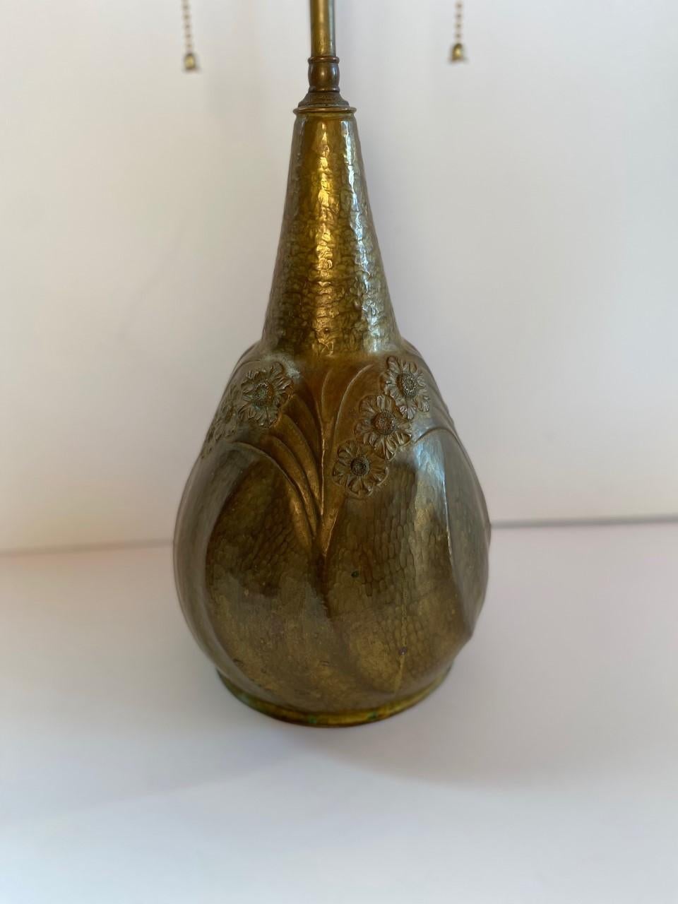 Belgian Art Nouveau hammered pewter gourd shape lamp by artist Leon Provins (Belgium, 1873-1943).
Signed L. Provins on lower half of lamp structure. Stamped on bottom, Made in Belgium.
The craftsmanship portrayed in this museum quality piece,