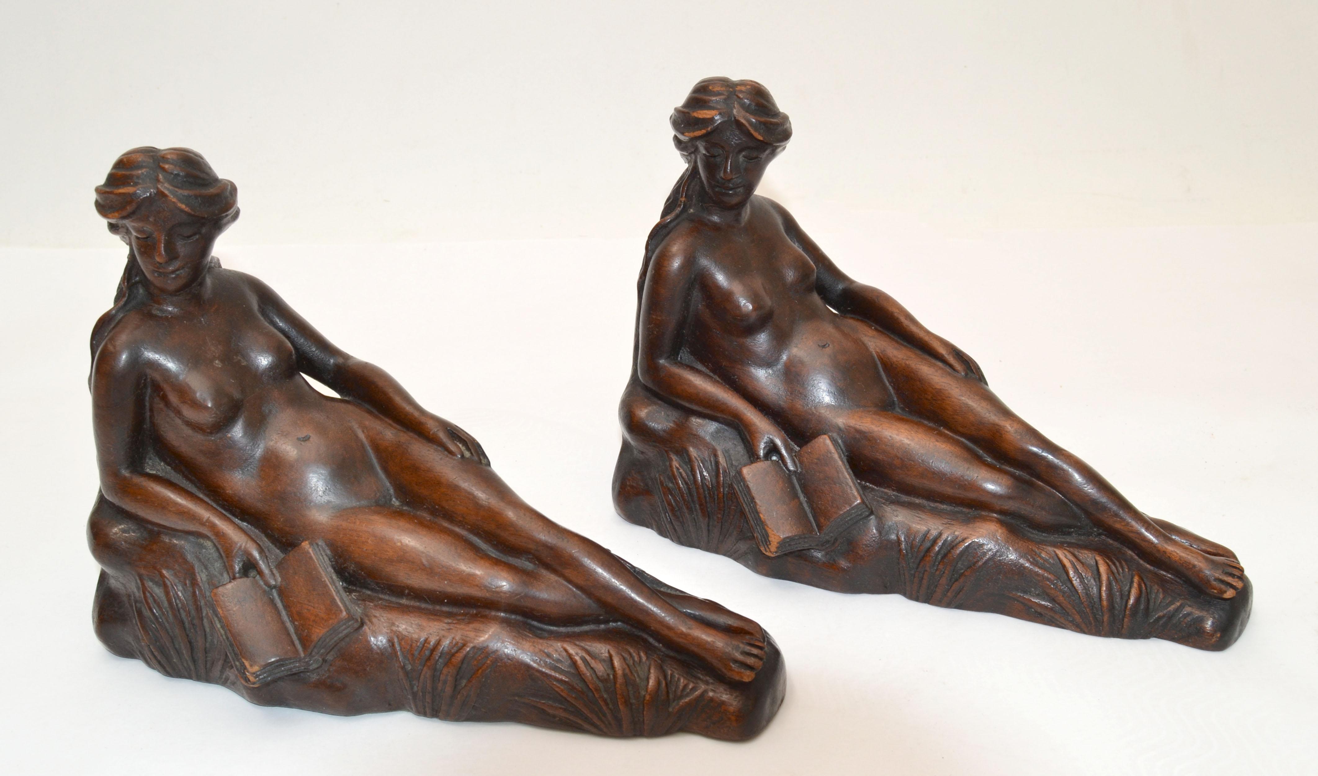 One of a kind Art Nouveau handcrafted carved oak wood Bookends depicting a Nude Female reading a book resting.
Base is covered in green felt.
In good original vintage condition with minor fading of the oak wood.