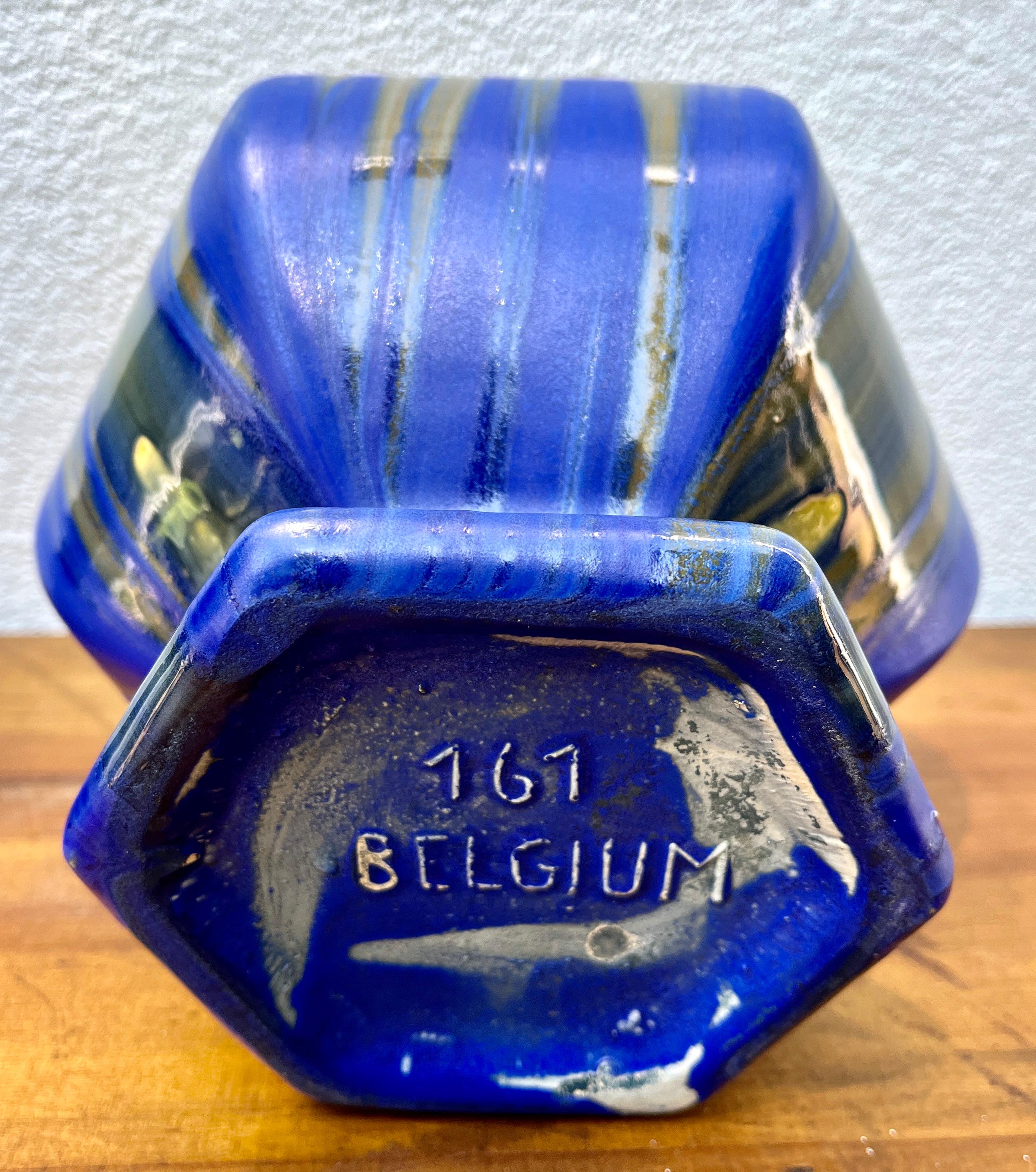 Brilliant handmade hand-glazed Art Nouveau planter jardinière, 1930.
Stamp: Belgium 161
Handmade and hand-glazed in brilliant colored details.
Made in Belgium
Art Nouveau period 1930 fine quality.
The piece is in excellent condition and a real