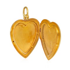 Art Nouveau heart locket with floral enamel decoration