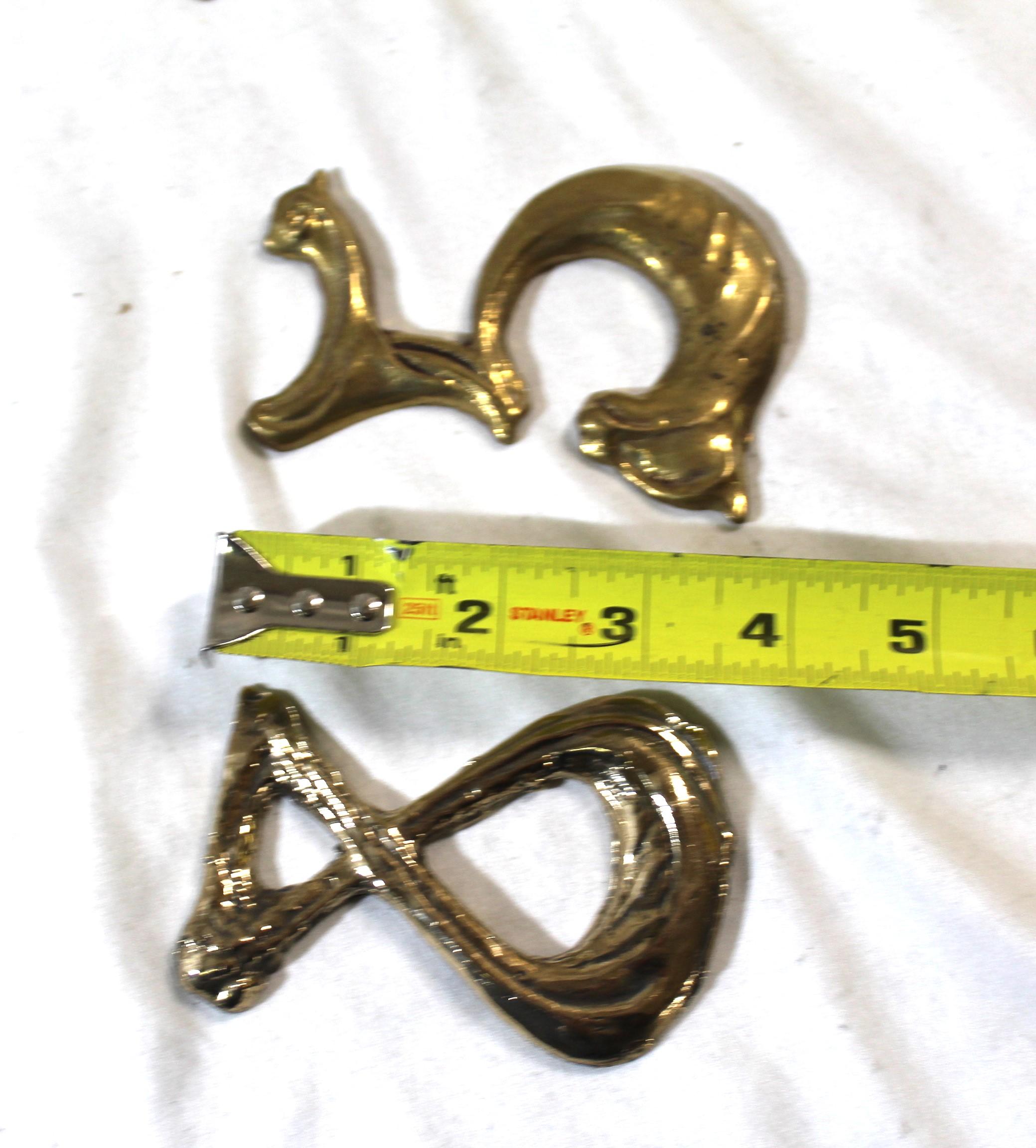 Art Nouveau bronze numbers cast in bronze from the design of Hector Guimard from France. They are cast from Lost Wax molds like the old ones . They are priced ( Each )  We have many of them . Let us know which one's you are interested in .   Very