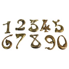 Números de casa Art Nouveau de bronce realizados según los diseños de Hector Guimard