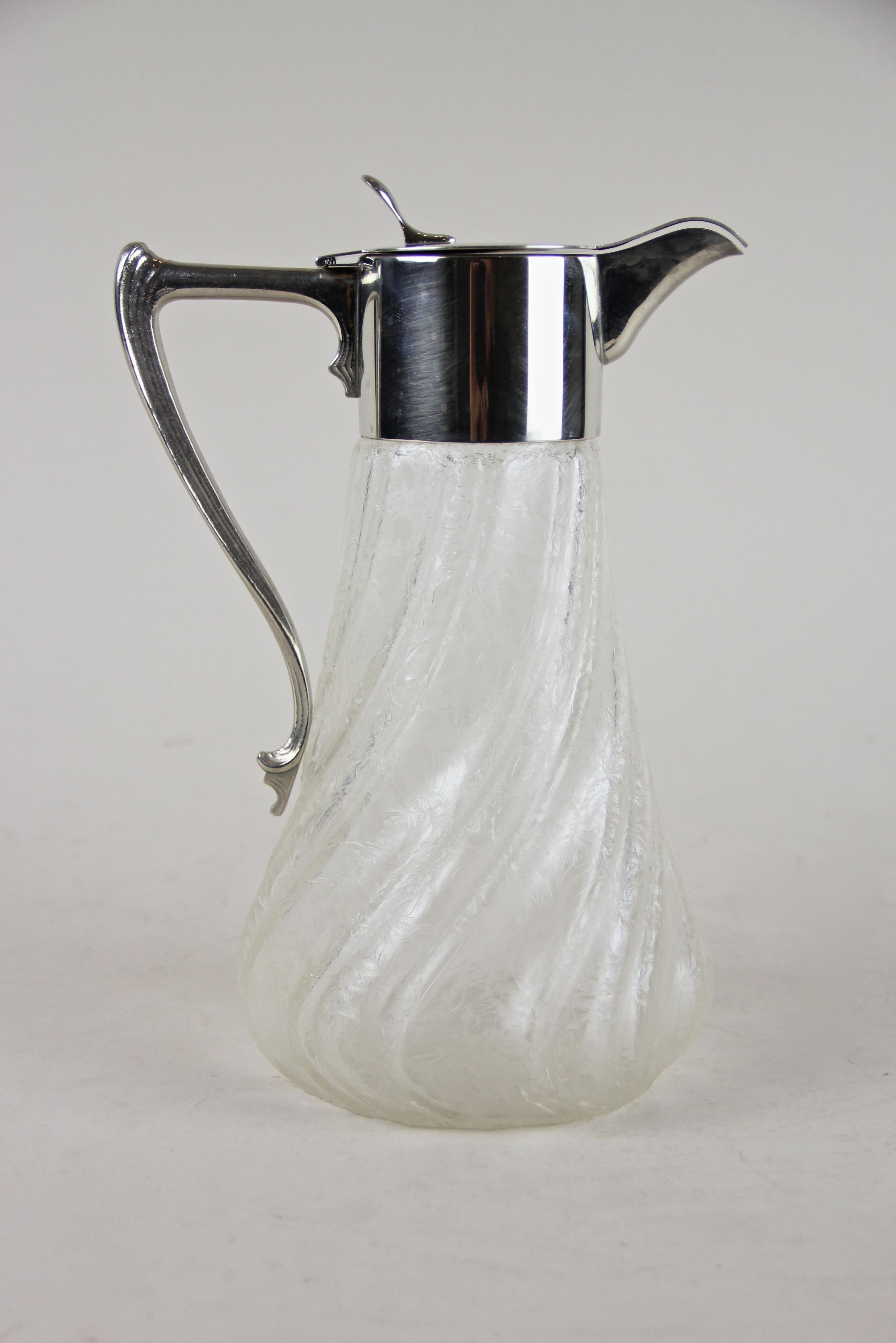 Unique Art Nouveau ice glass carafe out of Austria from the early 20th century, circa 1915. The wonderful shaped jug was made of amazing so-called 