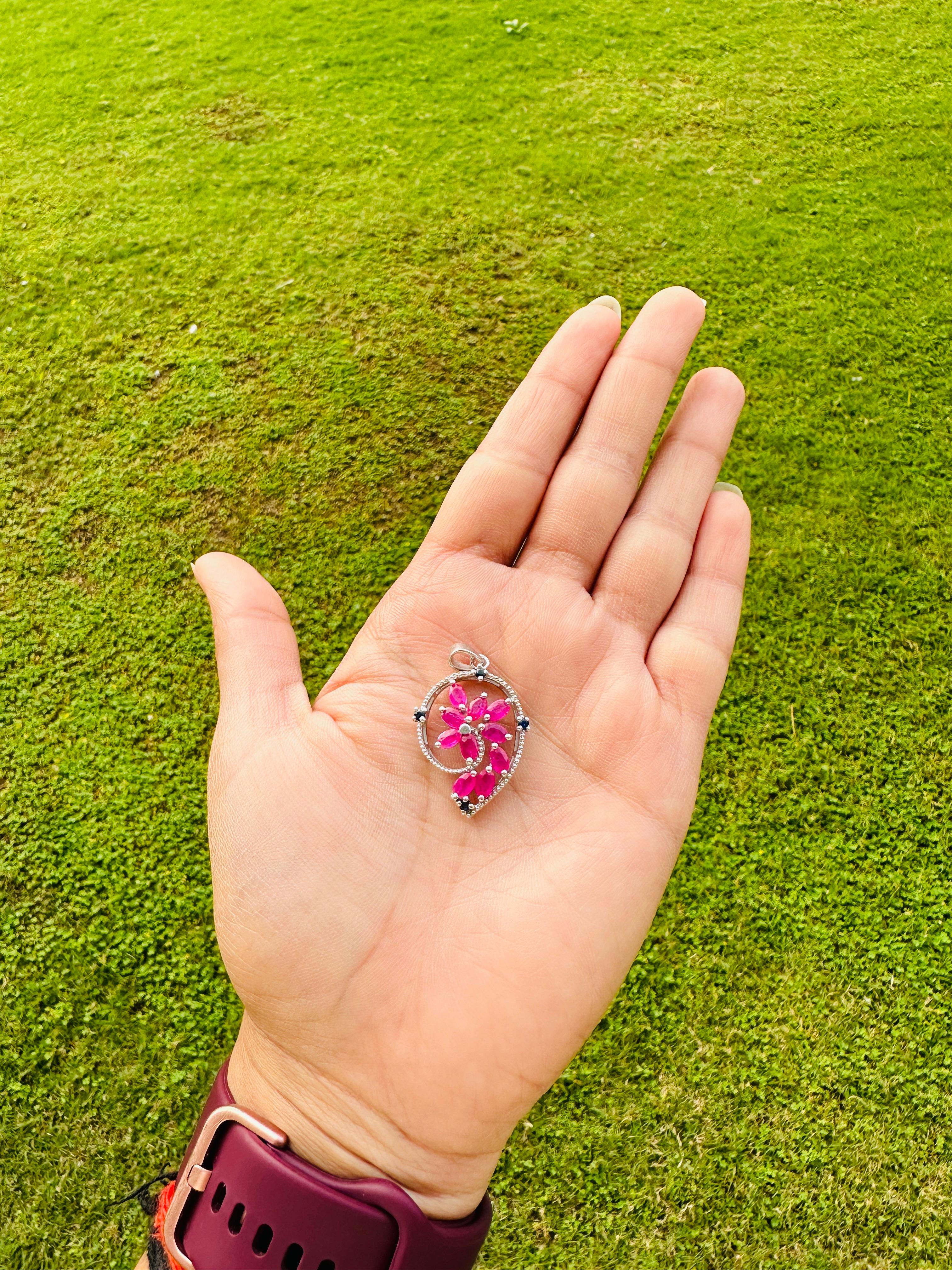 This Art Nouveau Inspired Ruby and Sapphire Pendant is meticulously crafted from the finest materials and adorned with stunning ruby and sapphire where sapphire helps in relieving stress, anxiety and depression and ruby enhances confidence,