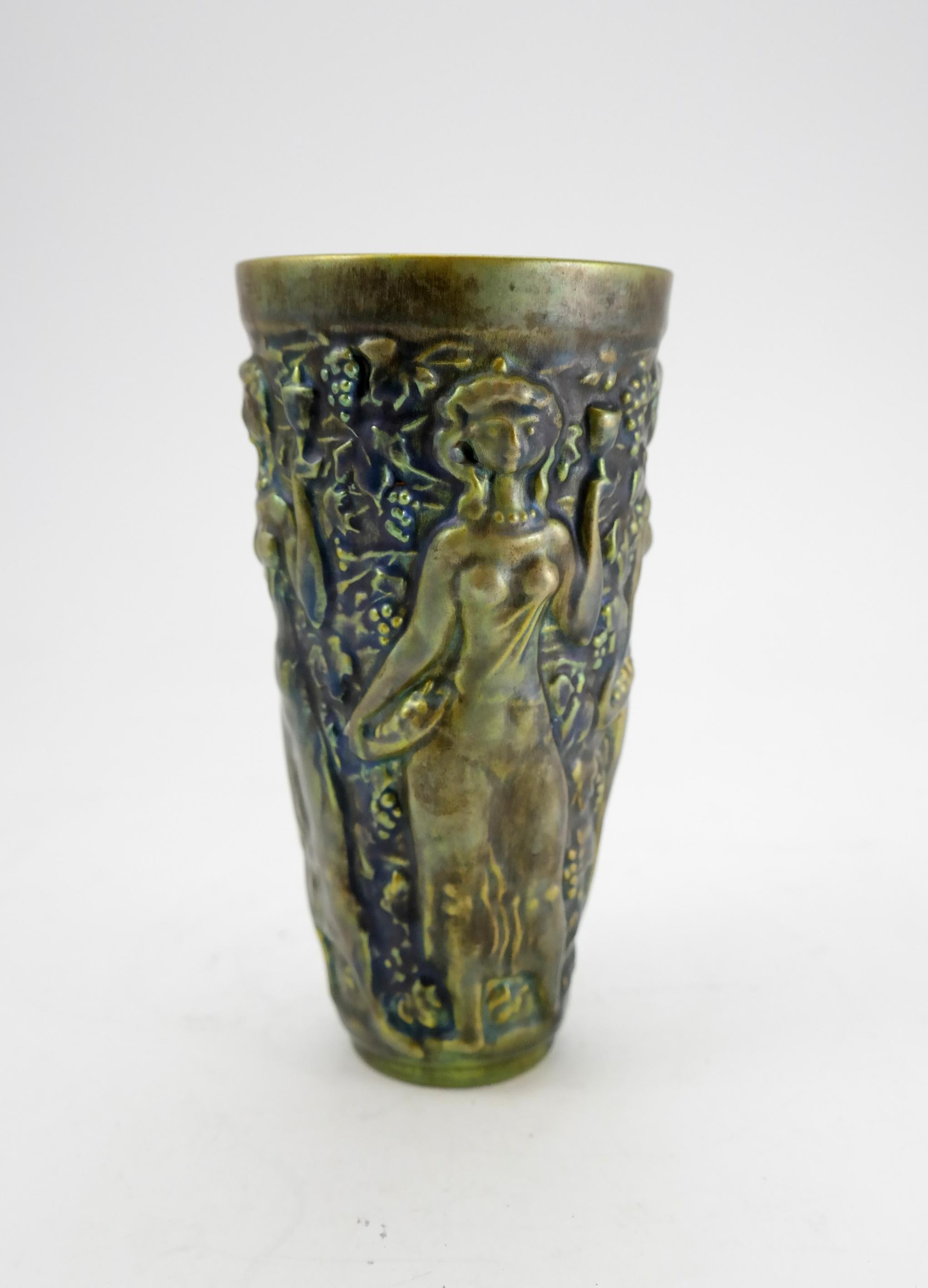Art Nouveau iridescent eosin glazed ceramic vase by Zsolnay, 1910s

Zsolnay is the only ceramic company that uses this unique green or yellow glaze, originating from the Art Nouveau area. Zsolnay pieces are highly collectible.
The history of the