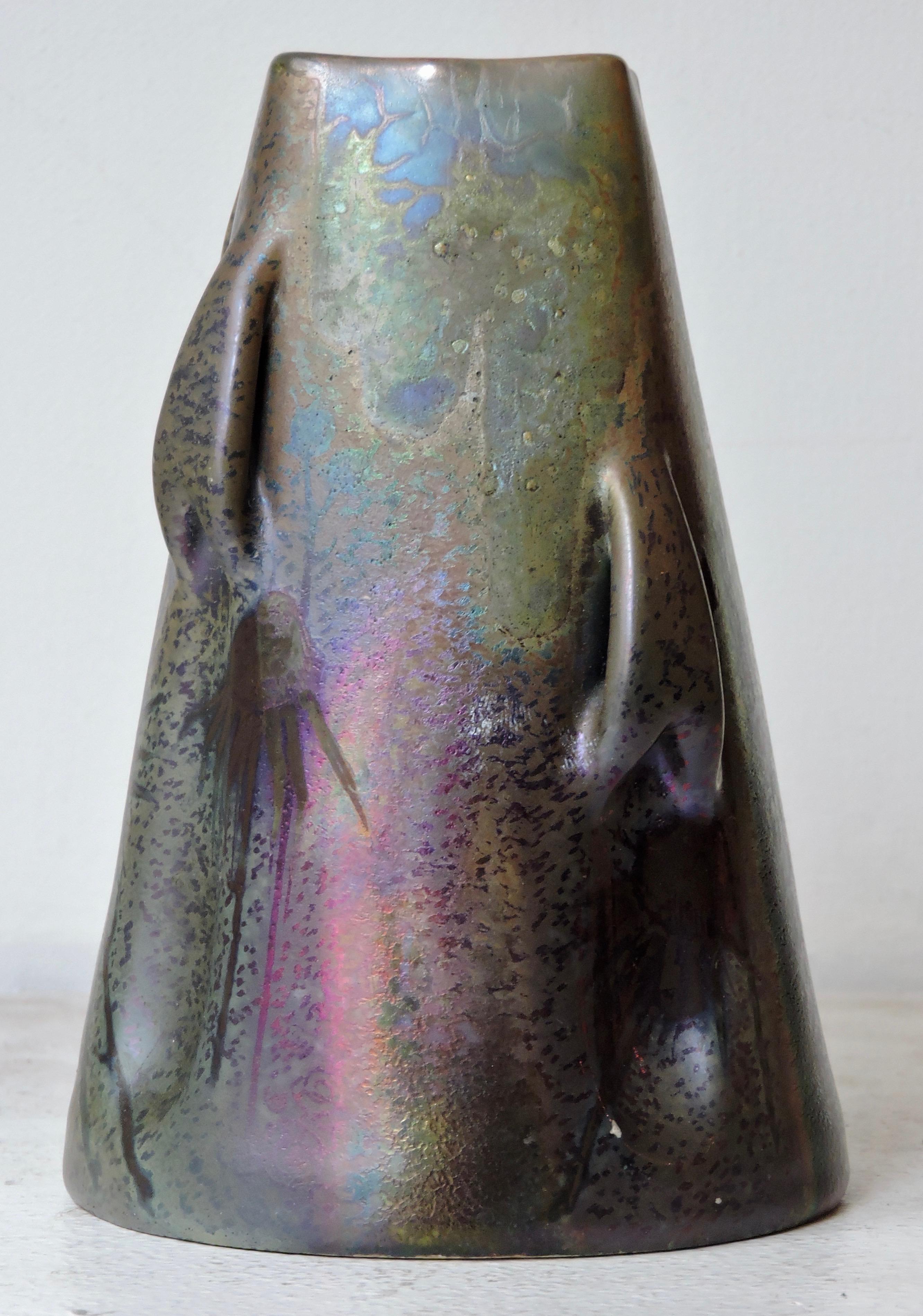 An iridescent glazed earthenware vase by Clément Massier
Thistle and mushrooms design
Painted and impressed marks Clement Massier Golfe-Juan AM.