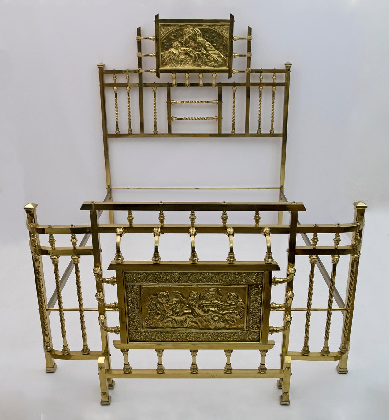Large Italian double bed from the early 20th century. Fabulous quality object and gilded brass decoration. Bed decorated with plaques depicting female characters and neoclassical cherubs, in the style of French Art Nouveau or Italian Liberty, (see