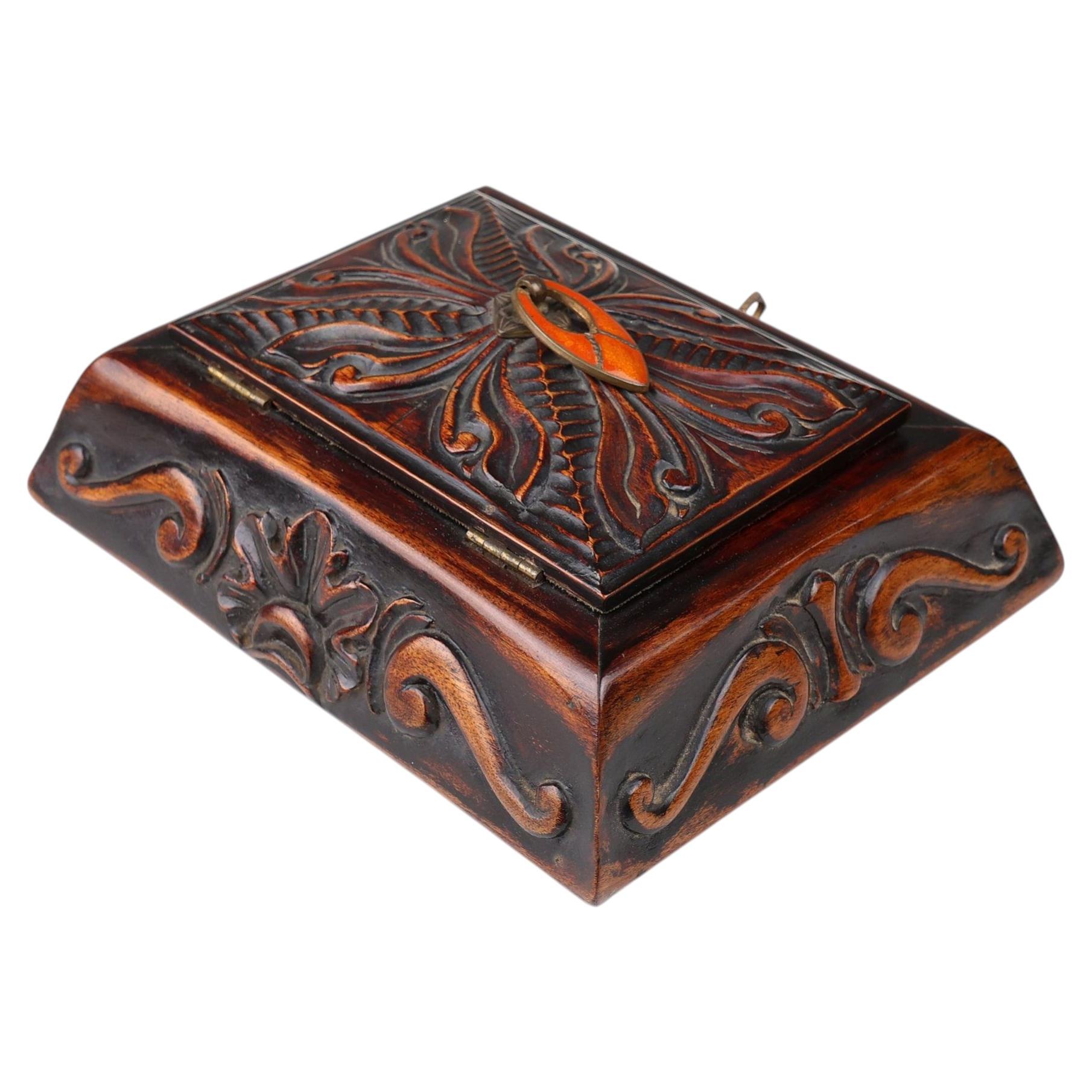 Art Nouveau jewelry box in sculpted wood, France ca. 1915