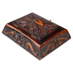 Art Nouveau jewelry box in sculpted wood, France ca. 1915