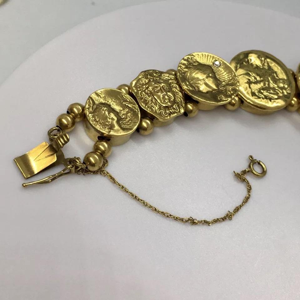 Art Nouveau Ladies Pictorial Slide Bracelet 14K Gold 52.3 Gram 7.5 inch

Add a touch of elegance to your wrist with this stunning Art Nouveau Ladies Pictorial Slide Bracelet. Crafted with 14K yellow gold, this bracelet weighs 52.3 grams and measures