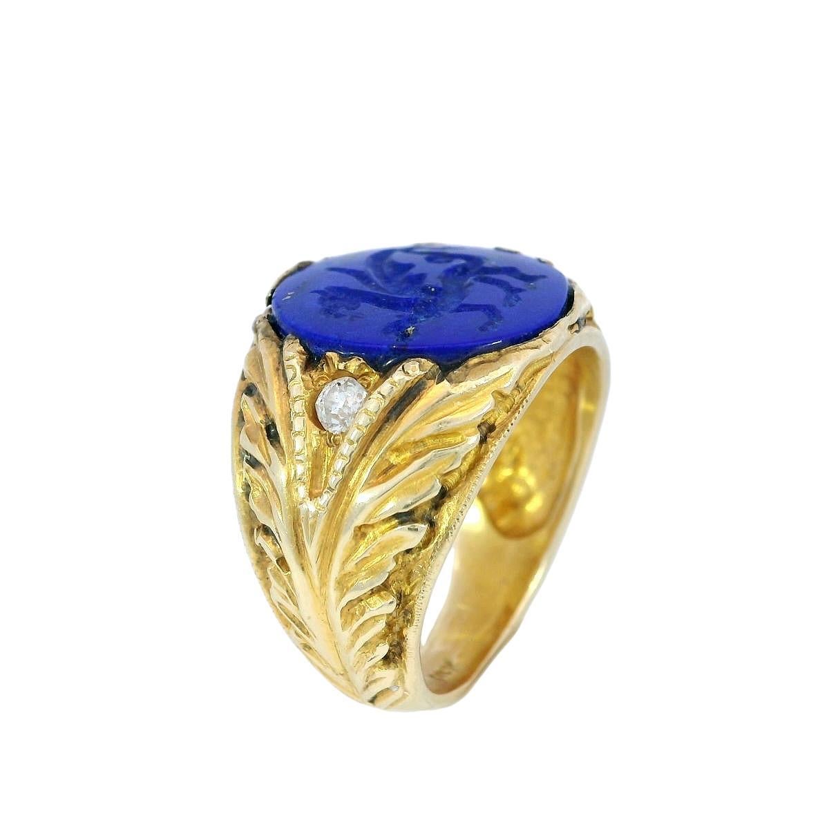 Art Nouveau Lapis Signet Ring Carved Griffin 14K Yellow Gold Size 8.5

This Art Nouveau signet ring in 14k yellow gold features a richly hued lapis lazuli, intricately carved and set as the centerpiece. The deep blue stone is flanked by small