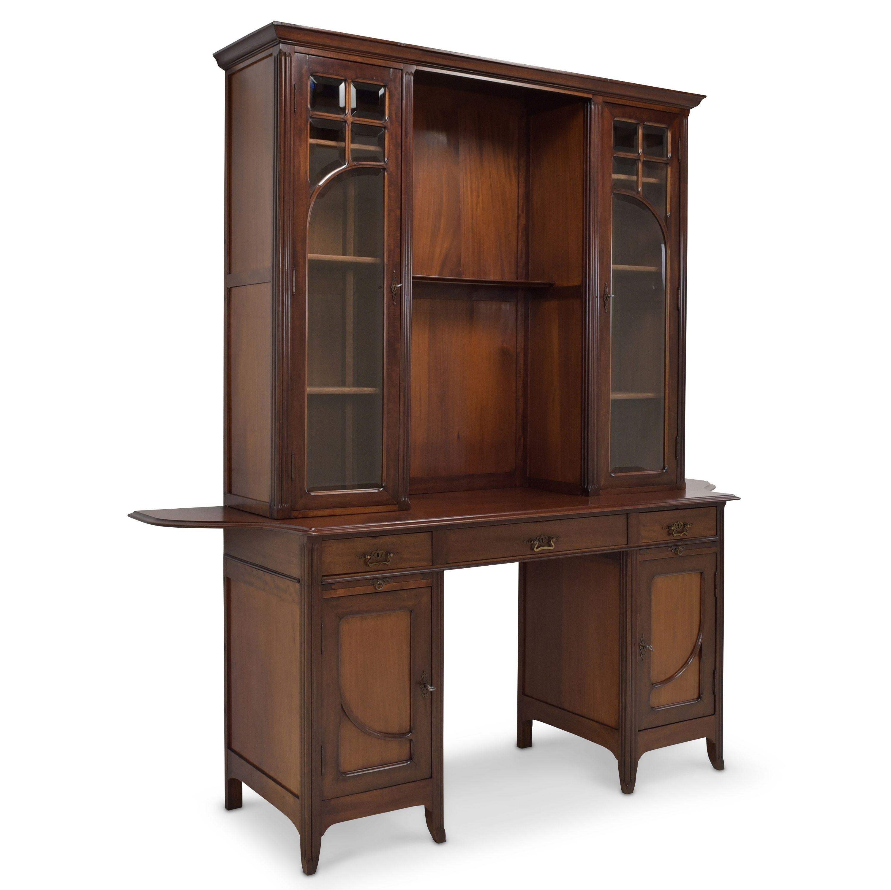 Large Art Nouveau buffet restored mahogany showcase library cabinet

Features:
Lower part open in the middle with two doors, two drawers, three drawers
Top section with two glass doors, each with three shelves and an open compartment in the