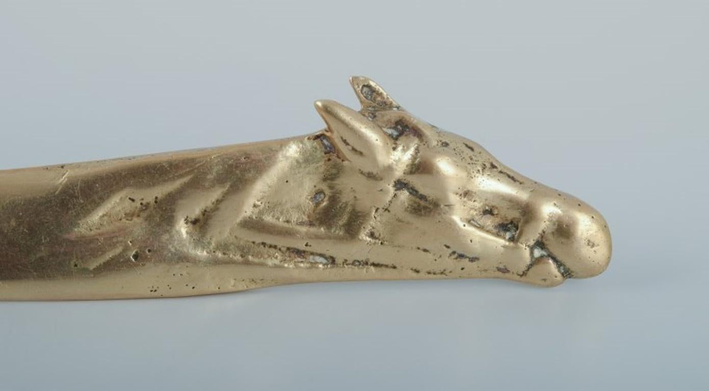 20th Century Art Nouveau letter opener in the shape of a horse's head. Brass.