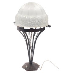 Art Deco table lamp with frosted glass hood