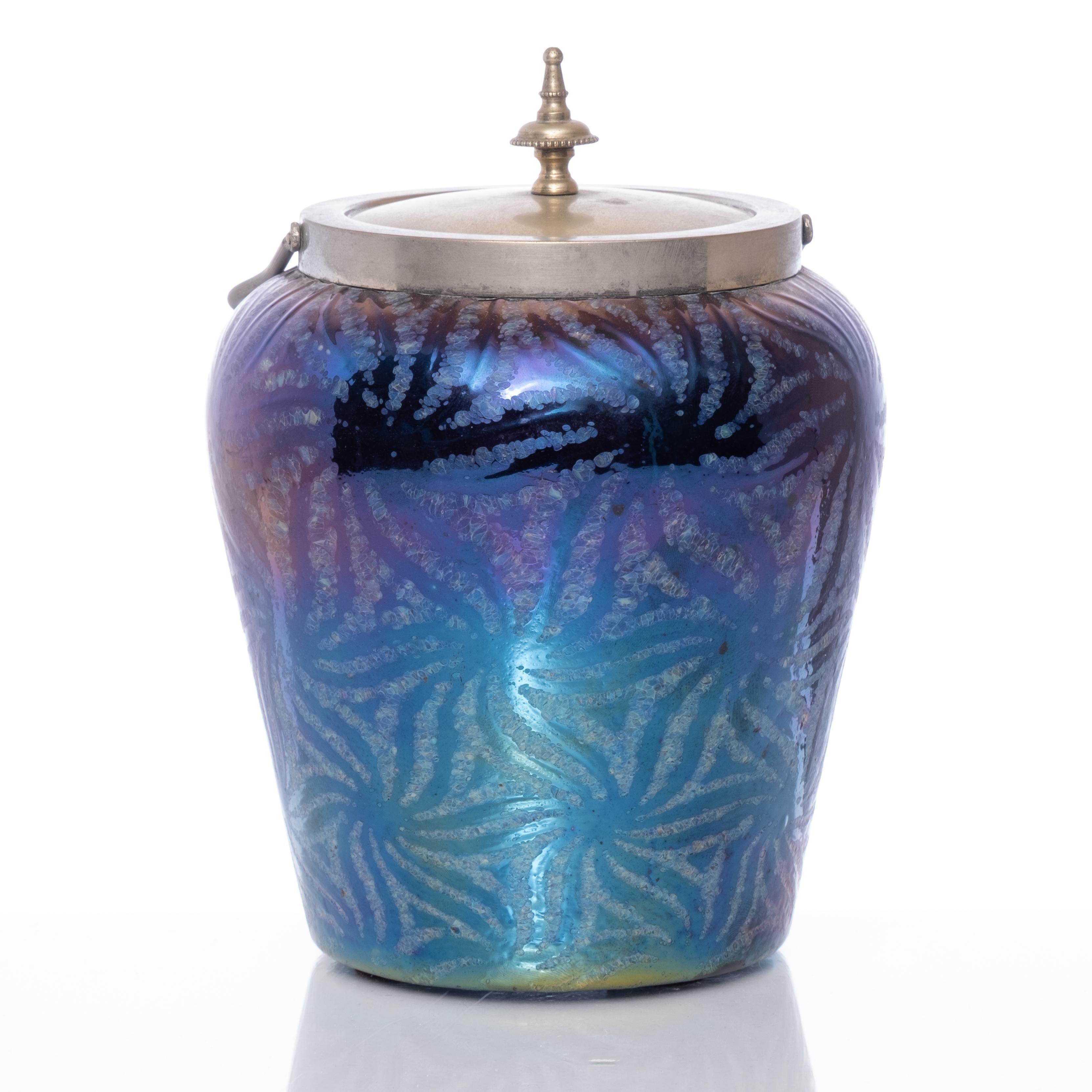 Loetz art nouveau period iridescent art glass covered biscuit jar with epns collar and cover, circa 1910. Unmarked. Dimensions: 6 3/4