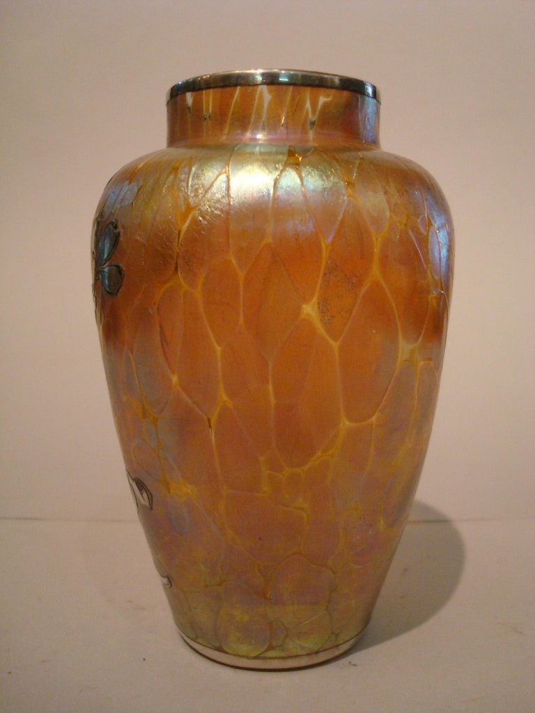 Art Nouveau glass vase with engraved silver overlay by historic Czech maker Loetz.