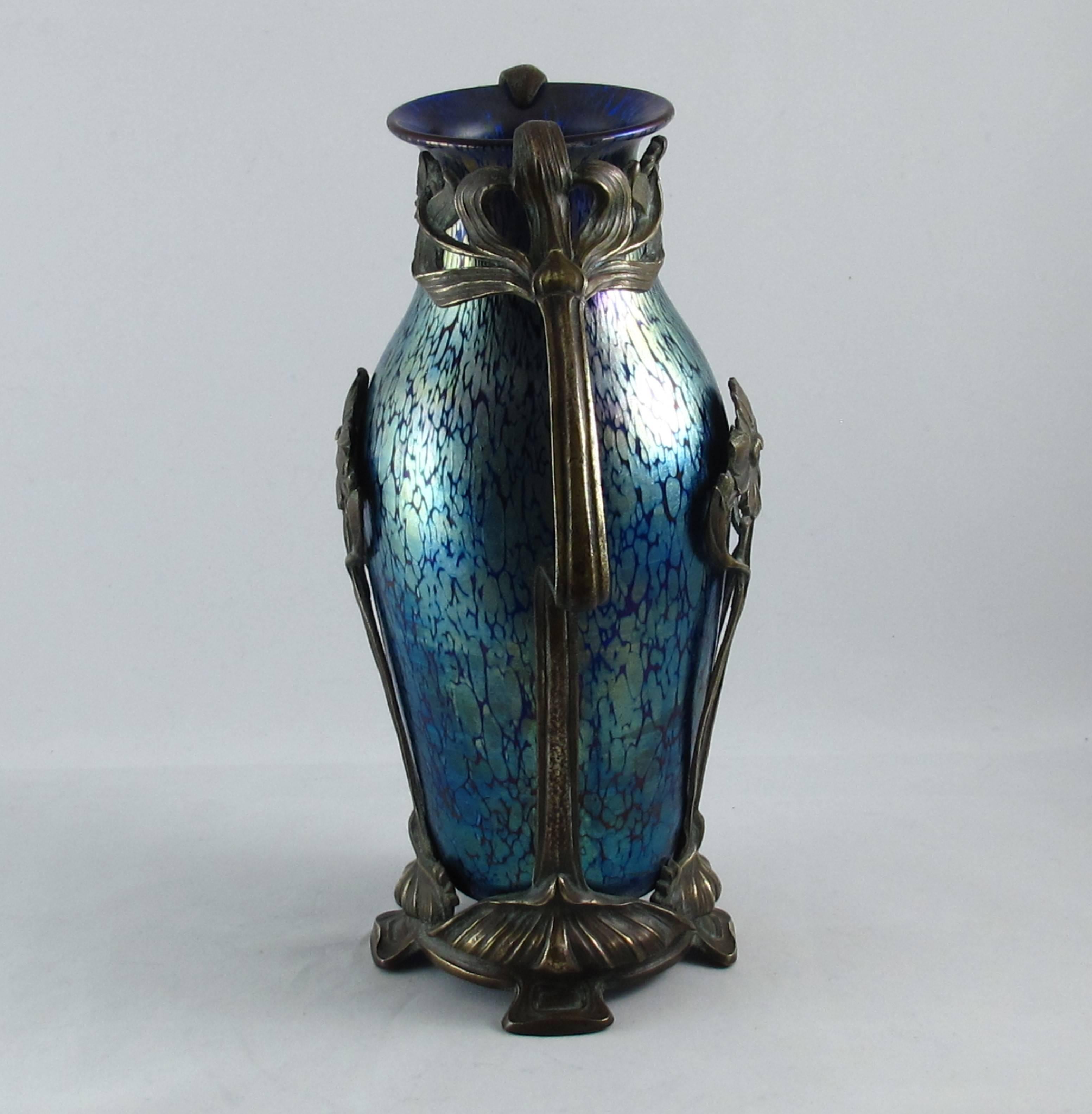 Large Loetz iridescent glass vase in the Papillon décor – cobalt blue on blue. The bronze mount in a design of flowers and leaves. Unsigned. A truly magnificent piece and a stunning example of Art Nouveau glass. Made by the Loetz witwe glassworks in