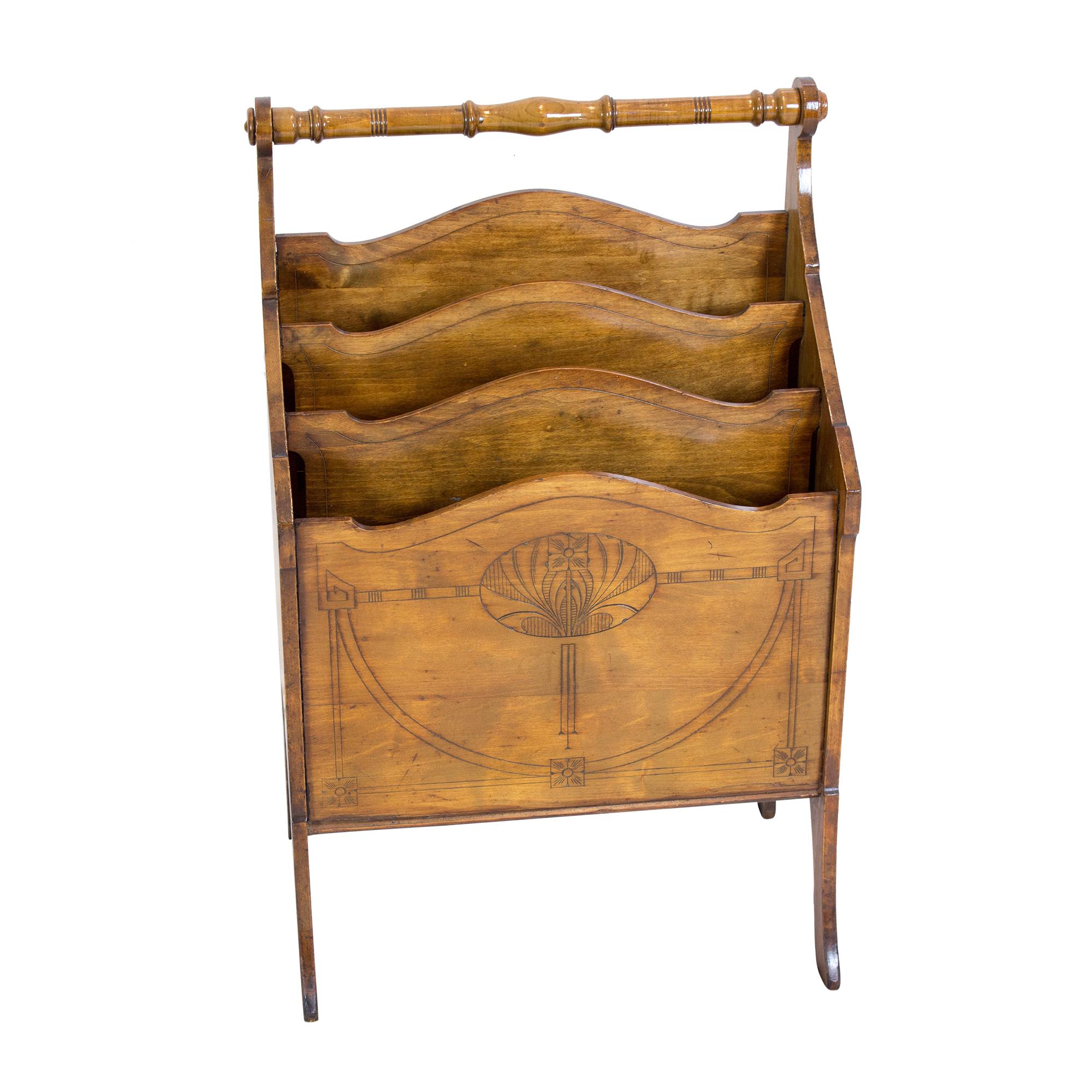 Solid wood walnut stained in beech wood. Extremely rare magazine rack or newspaper rack with three compartments. Turned handle and very beautiful Art Nouveau ornamentation on the front and sides.
Art Nouveau around 1900.