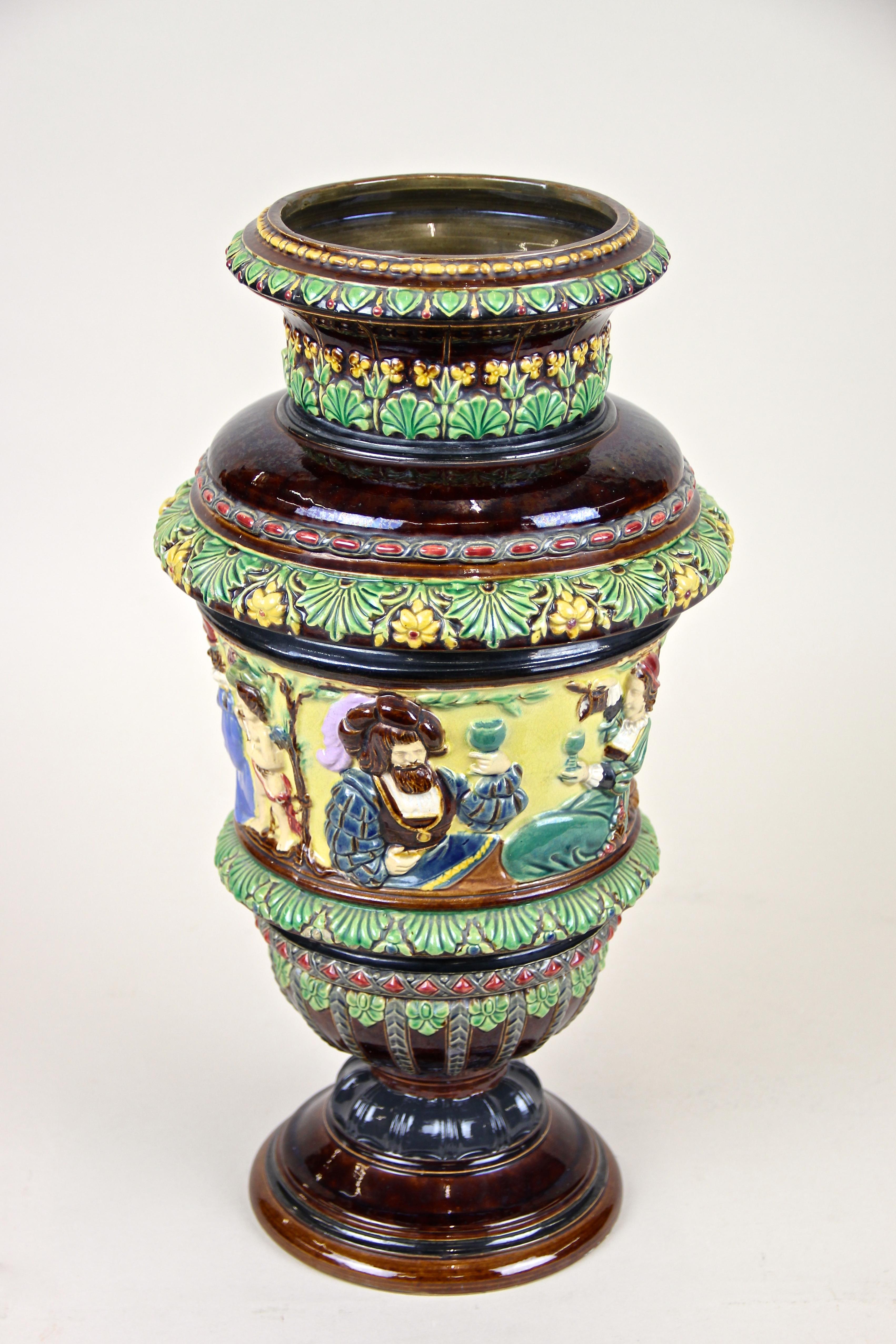 Large colorful Art Nouveau Majolica Amphora vase by Wilhelm Schiller & Son from circa 1900 in Bohemia. Coming in absolute perfect condition, this piece of Majolica art shows lovely depictions of noblemen reading, drinking and playing instruments