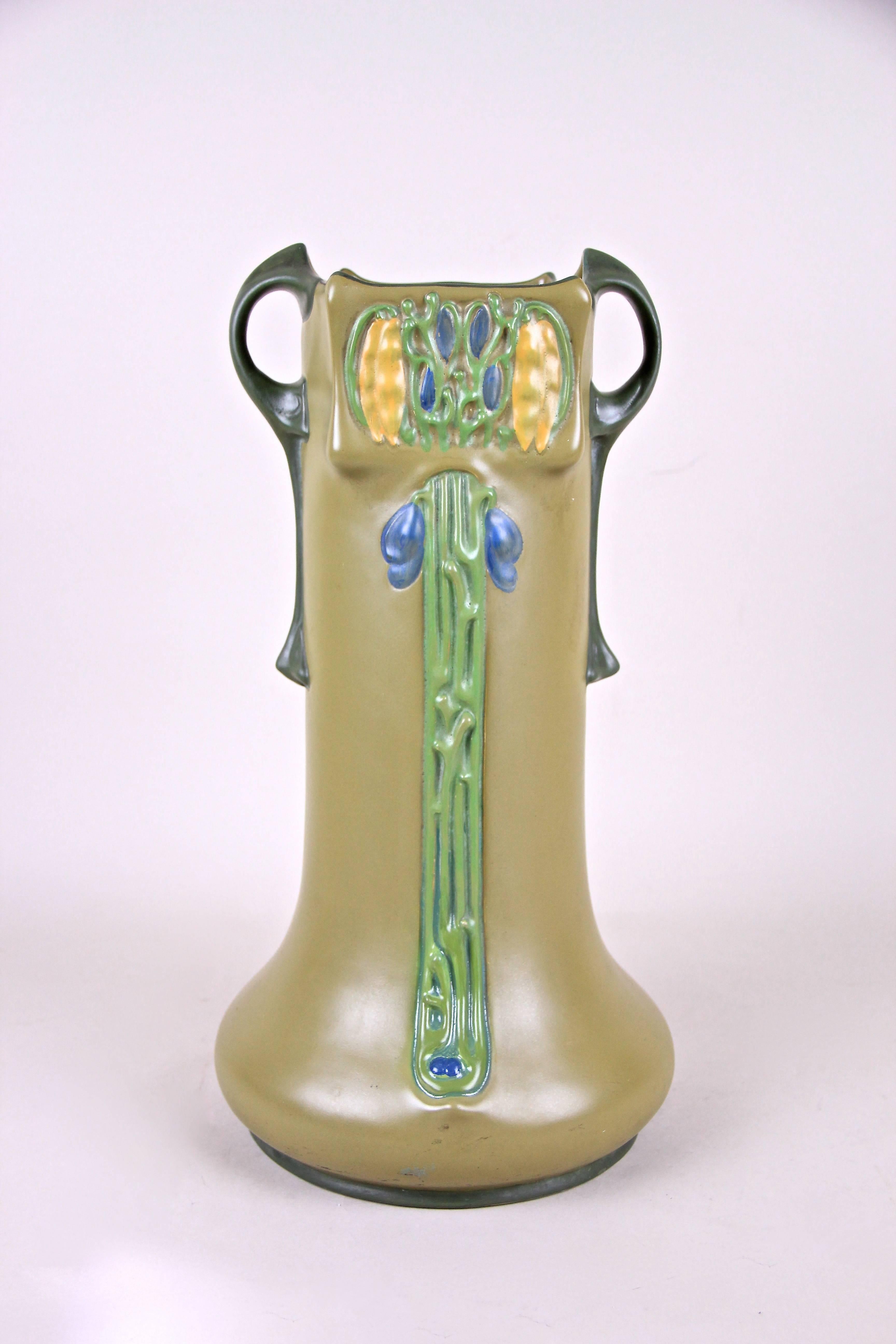 This outstanding Majolica Amphora Vase is an absolute classical piece of the Art Nouveau era.  It was manufactured by the famous company of Julius Dressler around 1900 and is in very good original condition. The beautiful shape combined with an
