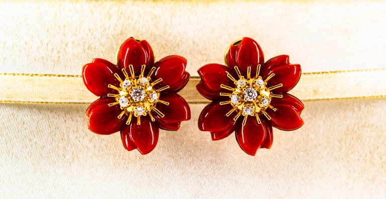These Earrings are made of 14K Yellow Gold.
These Earrings have 0.60 Carats of White Brilliant Cut Diamonds.
These Earrings have Hand cut Mediterranean (Sardinia, Italy) Red Coral.

These Earrings are available also in White Coral, Pink Coral,