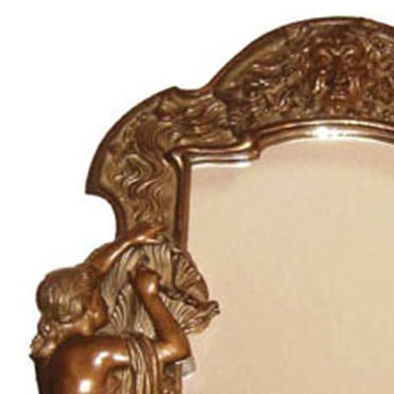 An Art Nouveau easel back frame dressing mirror w/full figure of woman.